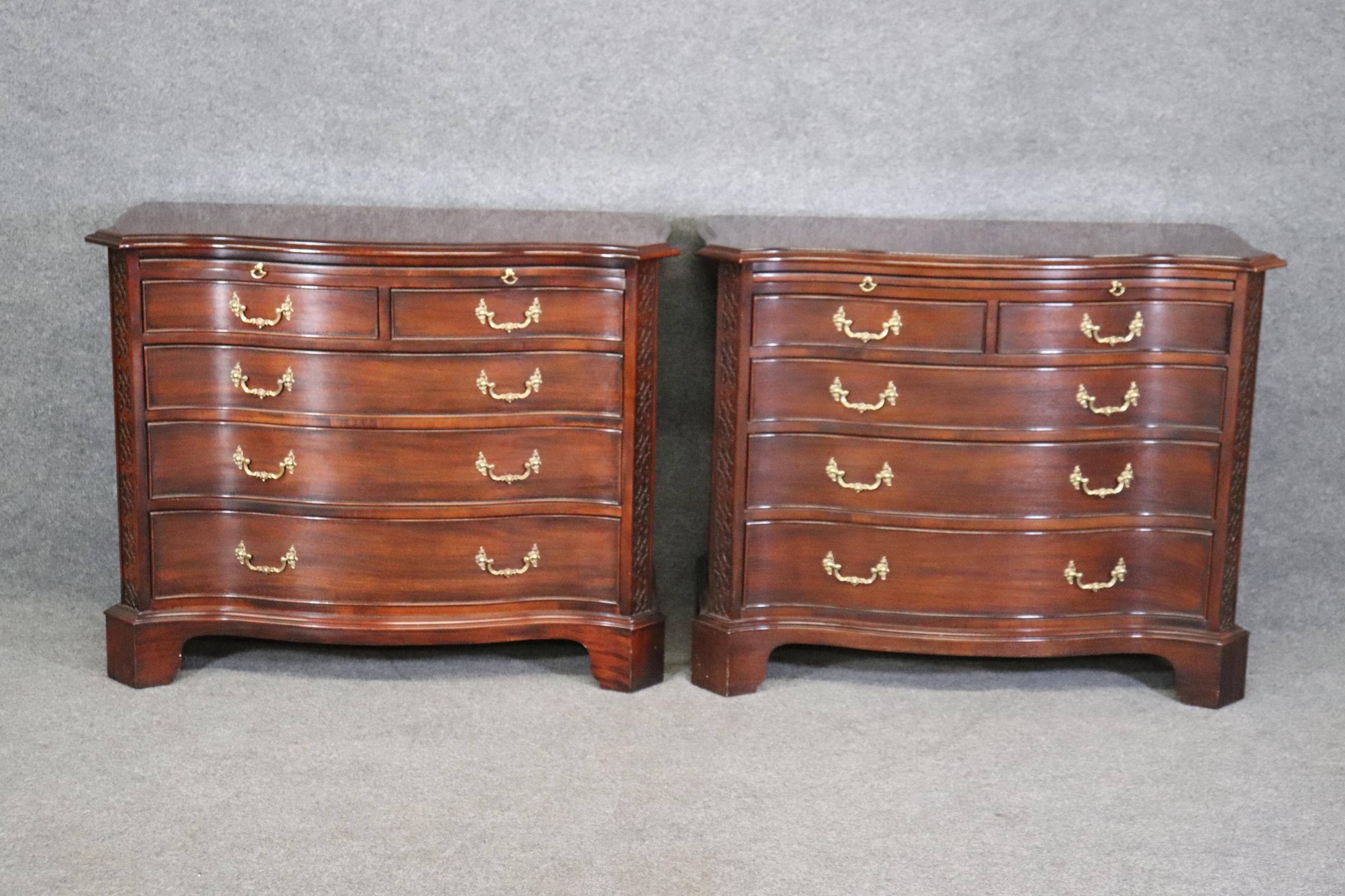 This is a beautiful pair of Century Furniture bachelors chests. The chests are designed in the Chippendale style and made of mahogany and oak secondaries. The chests are in good condition and one side of one cabinet from teh sun but otherwise they