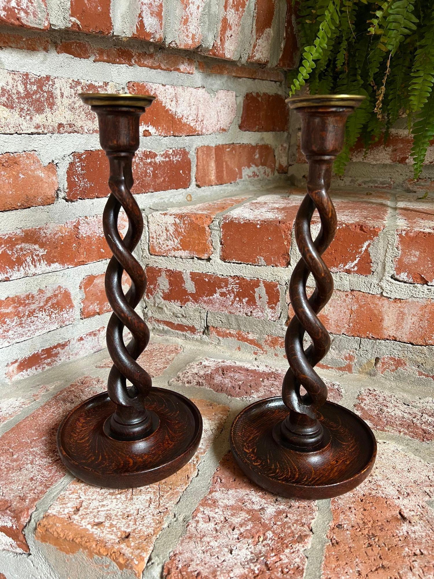 PAIR Set Antique English Oak OPEN Barley Twist Candlesticks Candle Holder Brass Bobeche.

Direct from England, a stunning pair of antique English oak barley twist candlesticks! These are the “open barley twist” design, highly sought after and hard