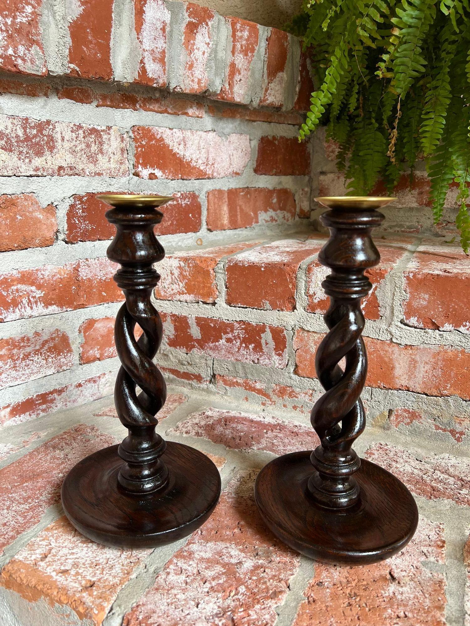 PAIR Set Antique English Oak OPEN Barley Twist Candlesticks Candle Holder Brass Bobeche

Direct from England, a stunning pair of antique English oak barley twist candlesticks! These are the “open barley twist” design, highly sought after and hard to