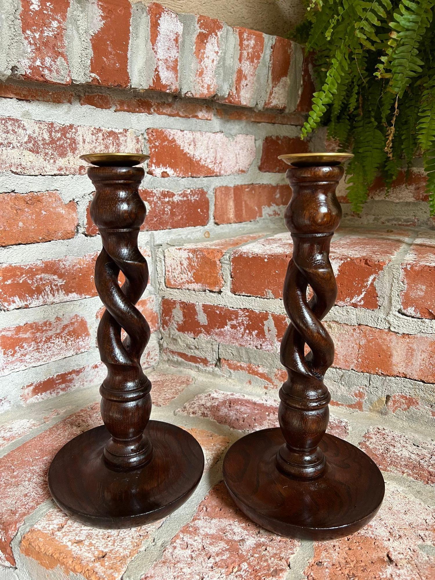 PAIR Set Antique English Oak OPEN Barley Twist Candlesticks Candle Holder Brass Bobeche.

Direct from England, a stunning pair of antique English oak barley twist candlesticks! These are the “open barley twist” design, highly sought after and hard