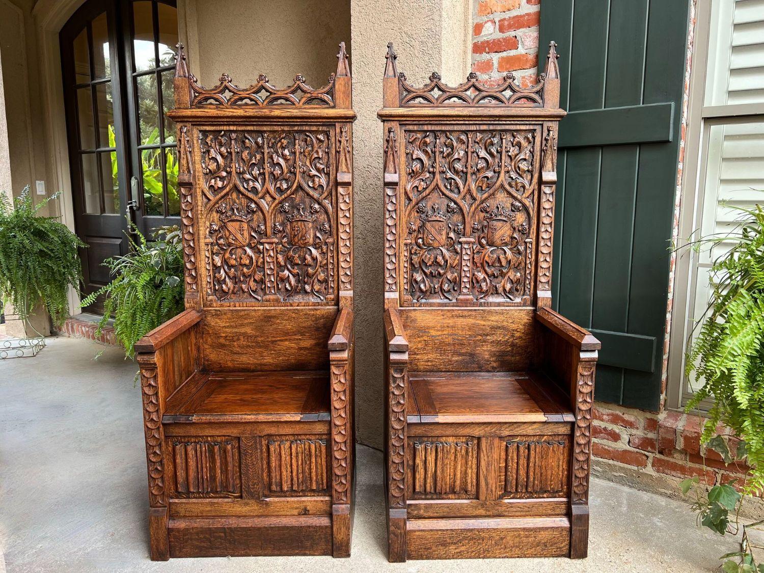 PAIR SET Antique French Hall Bench Gothic Revival Throne Altar Chairs Carved Oak.

Direct from France, a stunning MATCHED PAIR of majestic antique French benches/throne chairs!
Elaborate hand carvings throughout, with cathedral spires flanking the