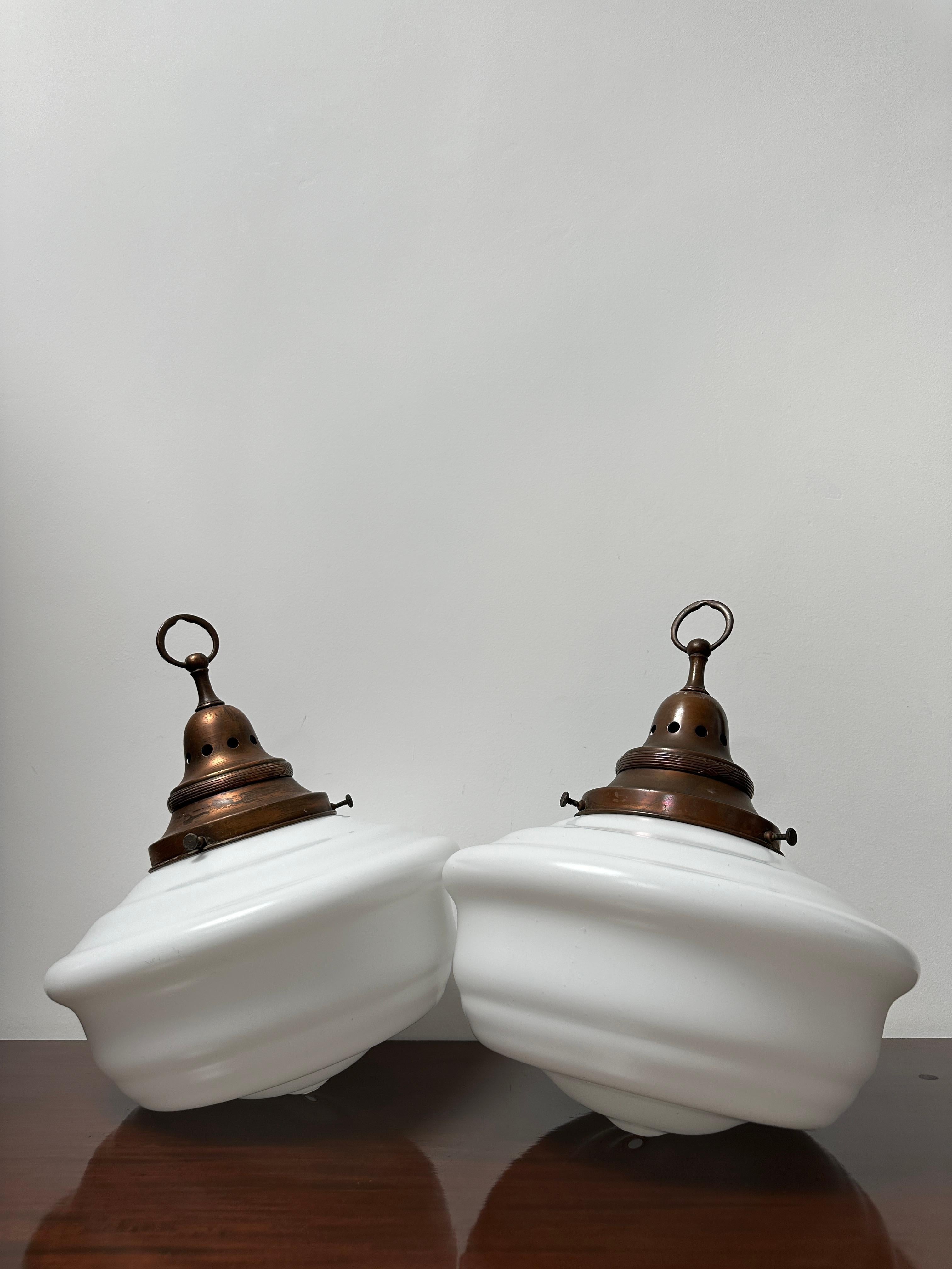 - A beautiful set of extra large satin opaline ceiling pendants with original galleries, England circa 1910.
- Silky satin finish to the huge opaline glass shades, typical of the manufacture seen in the early parts of the twentieth century,