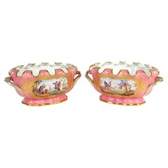  Pareja de macetas de porcelana dorada y pintada de rosa estilo Sèvres