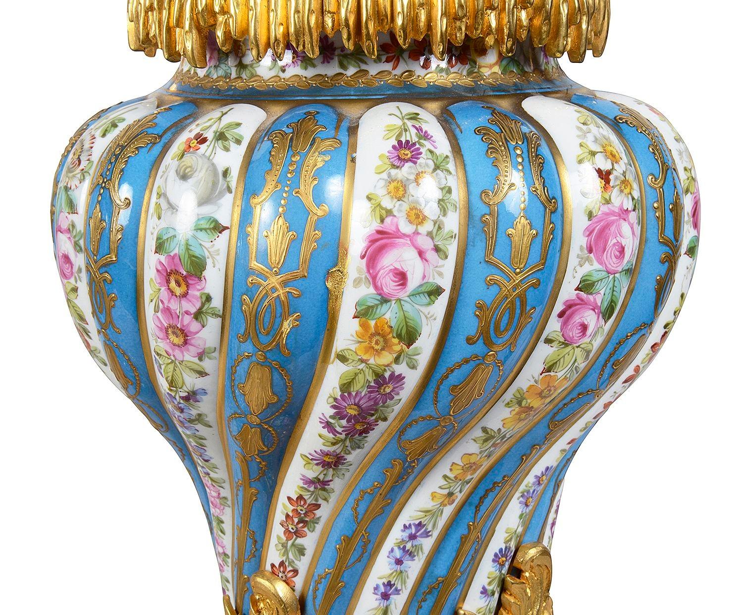 French Pair Sevres style porcelain lidded vases, C19th. For Sale
