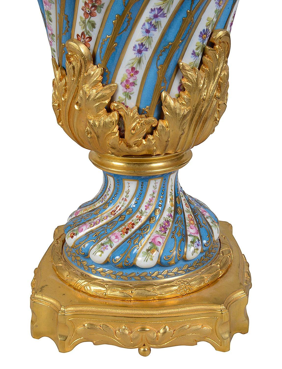 Hand-Painted Pair Sevres style porcelain lidded vases, C19th. For Sale