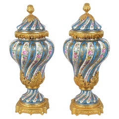 Pair Sevres style porcelain lidded vases, C19th.