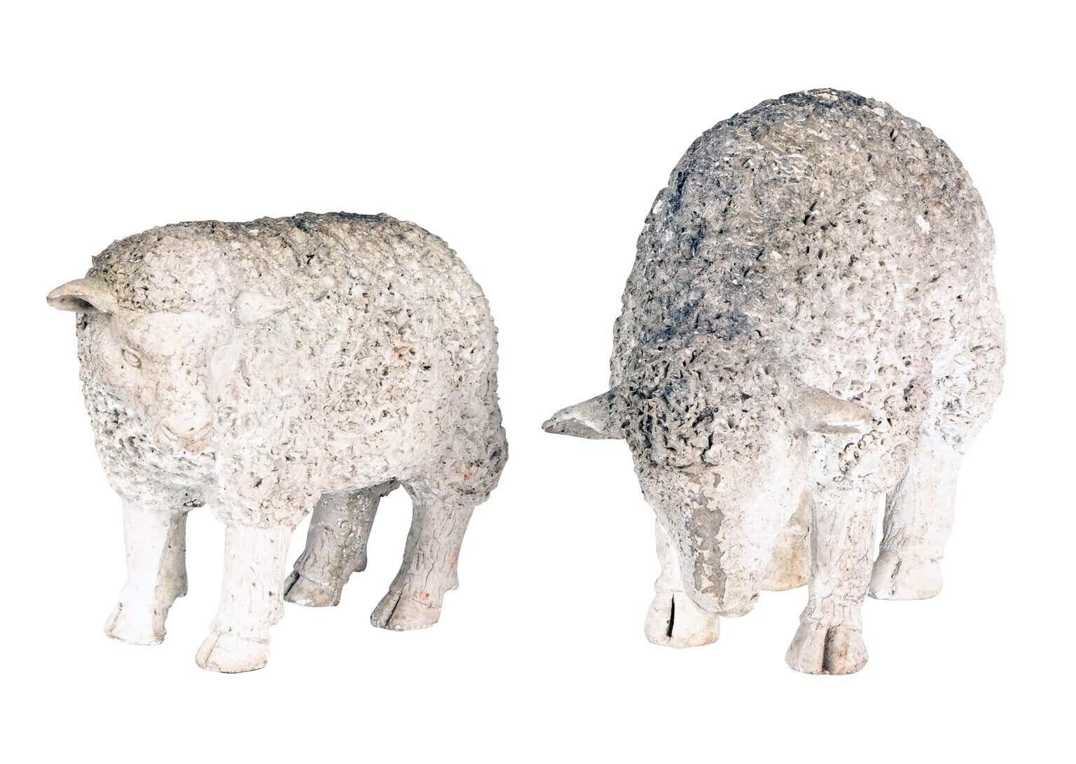 Elevate your garden with the charm of English mid 20th Century design through this delightful pair of sheep table top or garden ornaments. Crafted with meticulous attention to detail, each sheep embodies a whimsical touch while boasting lightweight