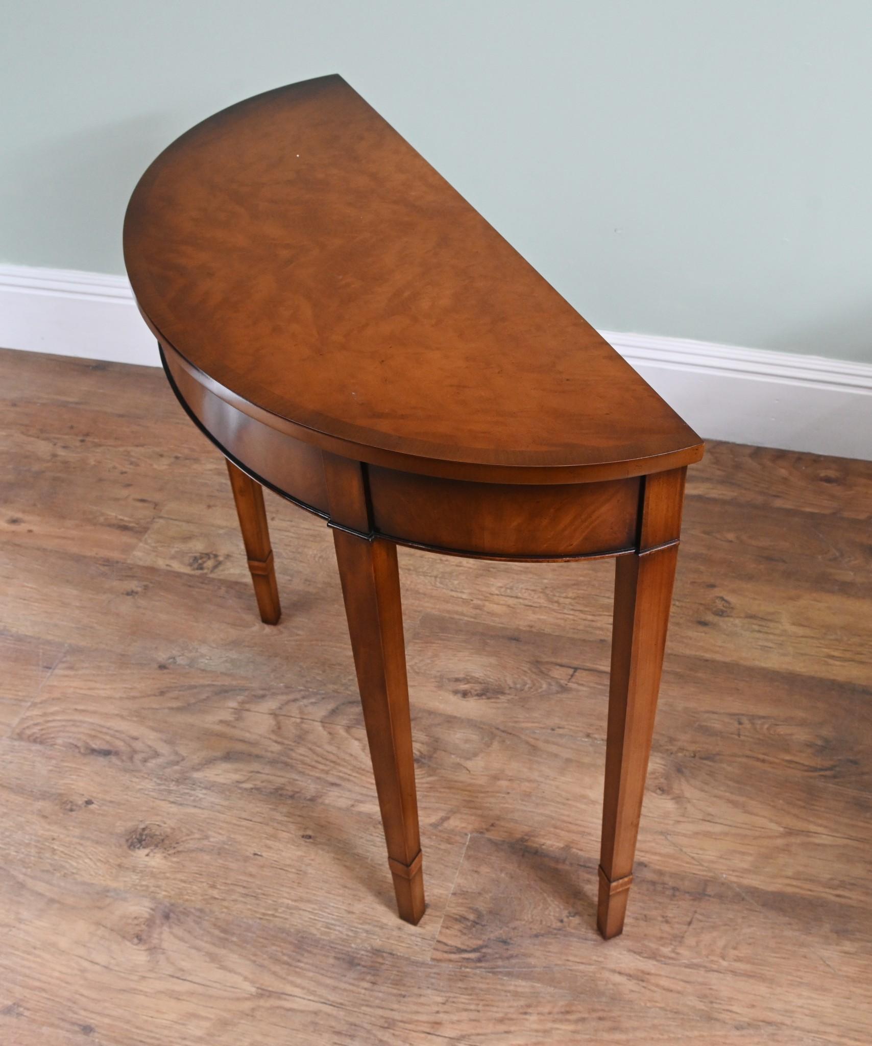 Gorgeous pair of Sheraton style console tables
Classic half round - demi lune - form
Clean and minimal design with tapered legs
Burr walnut has a lovely patina
Offered in great shape ready for home use right away
We ship to every corner of the