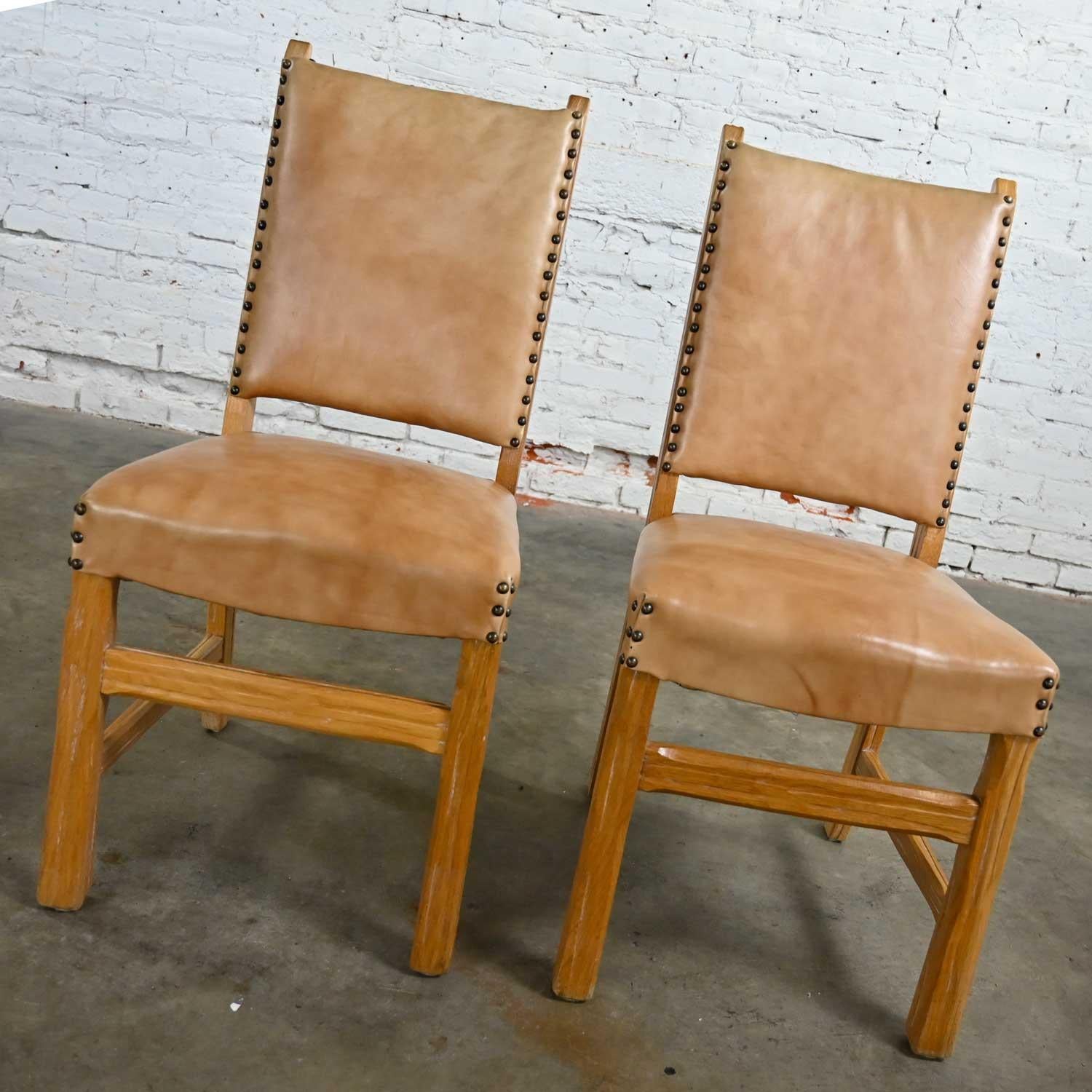 Pair Side Chairs Beige Vinyl Antiqued Brass Nail Head Trim Attr Brandt Ranch Oak In Good Condition In Topeka, KS