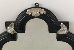 Coppia di sconsigliere firmate Caldwell con retro a specchio, intagliate in ebano e argento