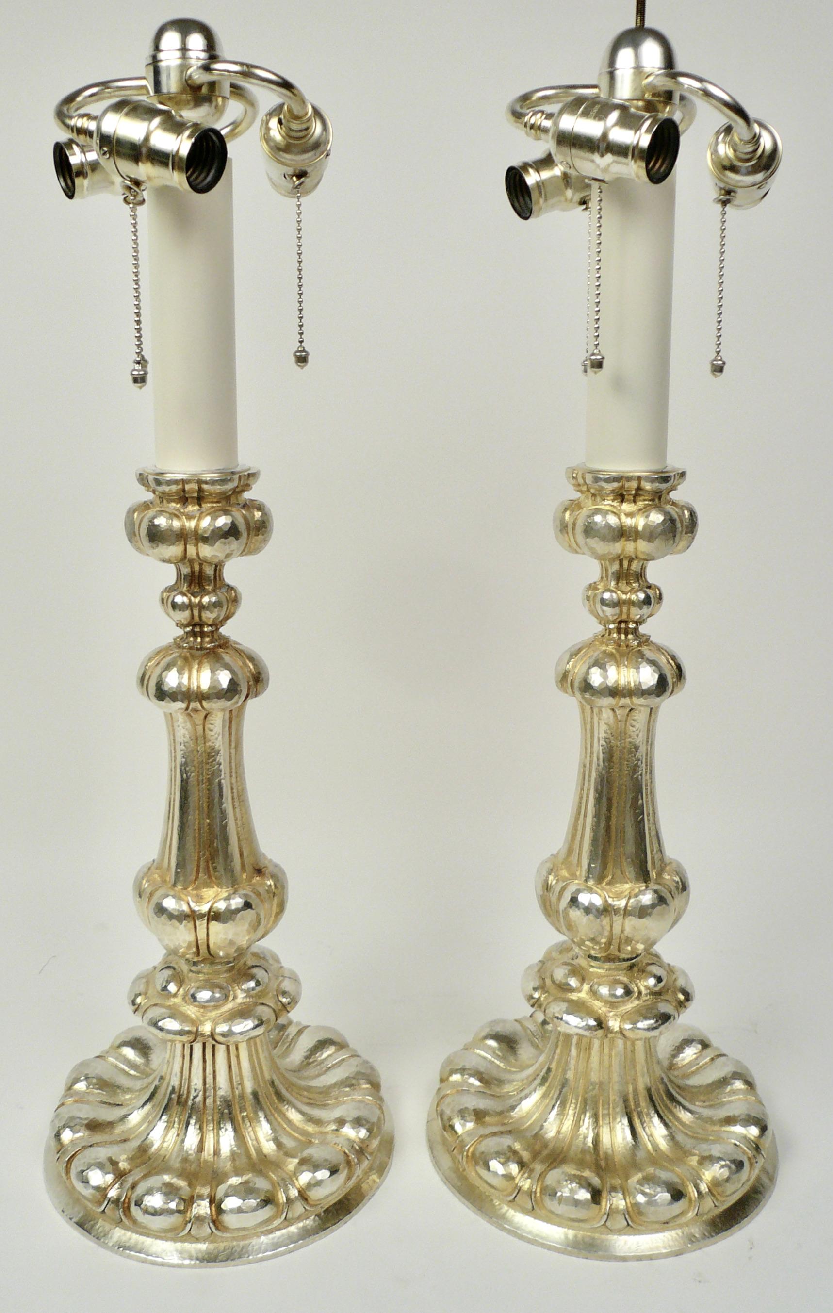 These hand hammered bronze pricket style lamps retain their original silver gilt finish.
Great for a Tudor style or Arts & Crafts interior, they are newly re-wired, and ready for use.