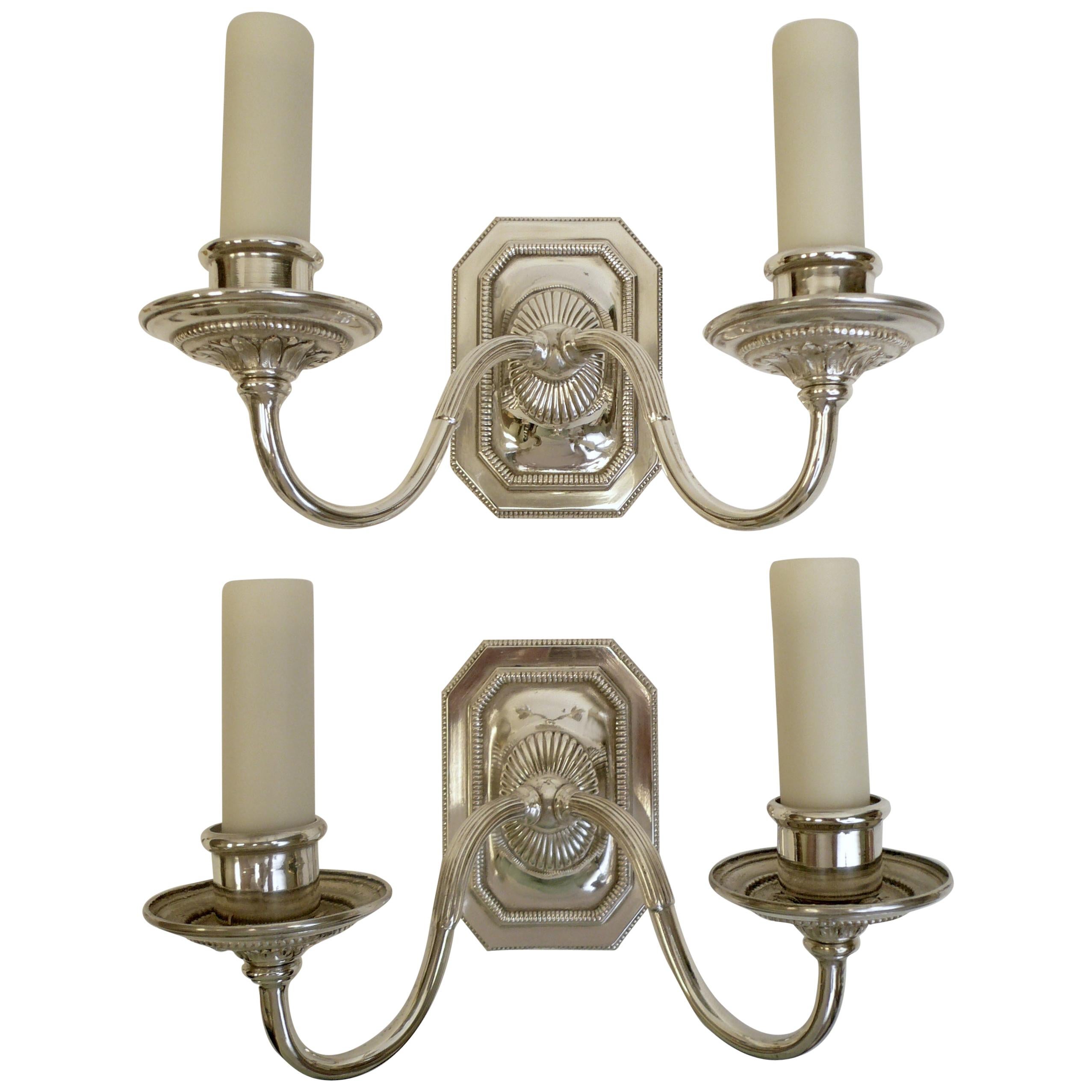 Pair of Signed E. F.Caldwell Georgian Style Two-Light Silver Sconces
