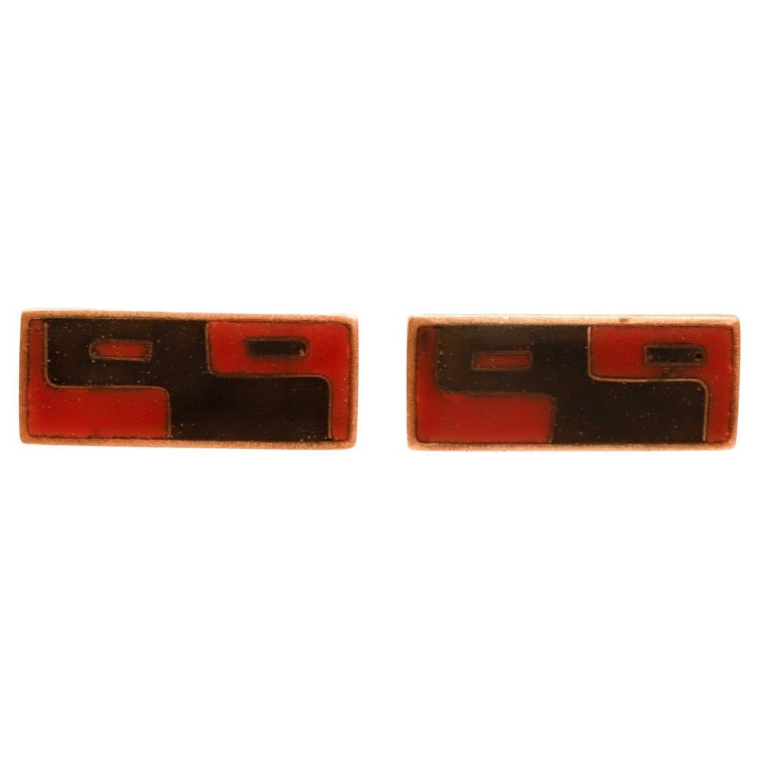 A fine pair of German Modernist brass cufflinks.

By Scholz & Lammel.

With abstract red & black enamel decoration.

Simply a wonderful pair of cufflinks!

Date:
20th Century

Overall Condition:
They are in overall good, as-pictured, used estate