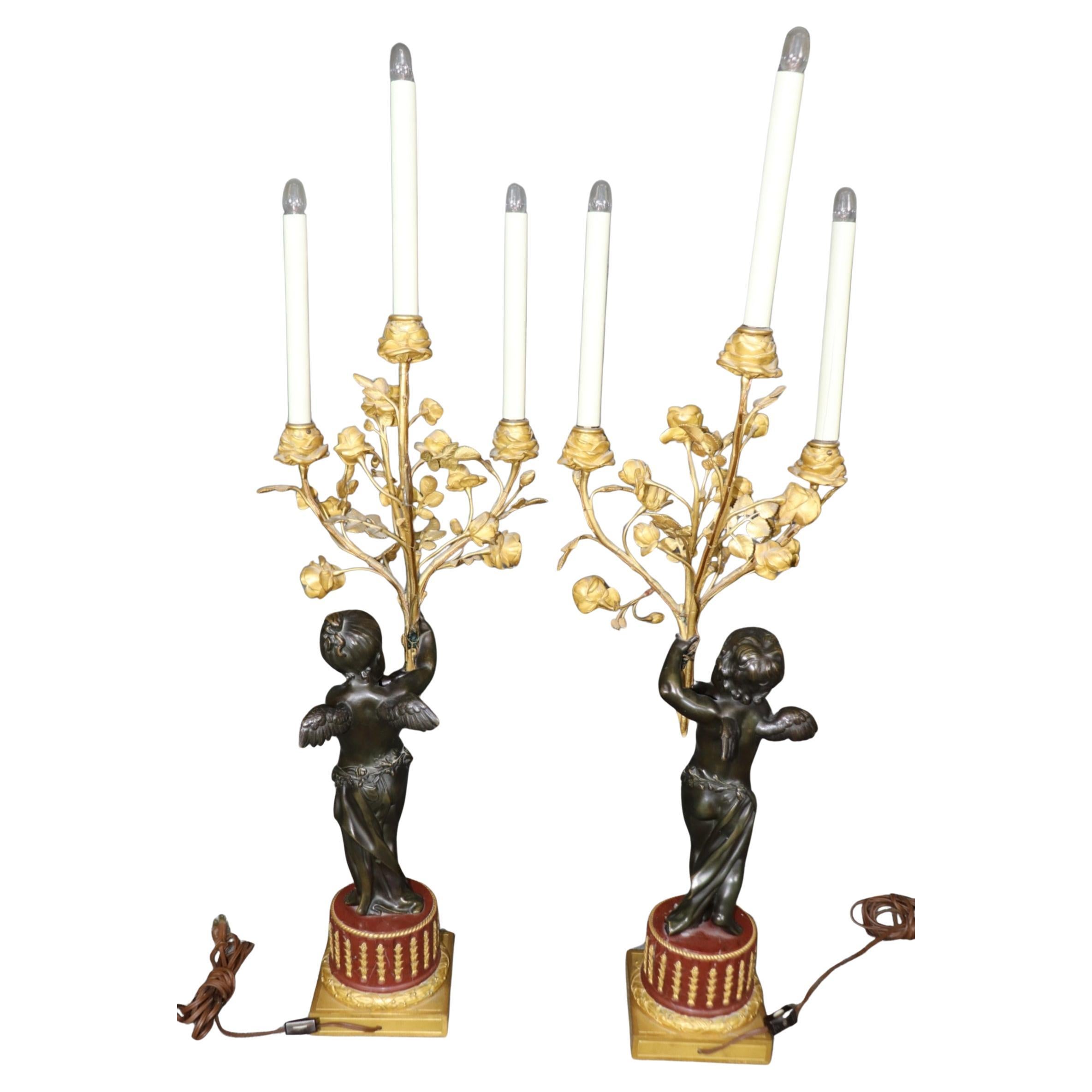 Français Paire de candélabres en bronze et bronze doré signés Henri Dasson, 19ème siècle, de style Louis XV. en vente