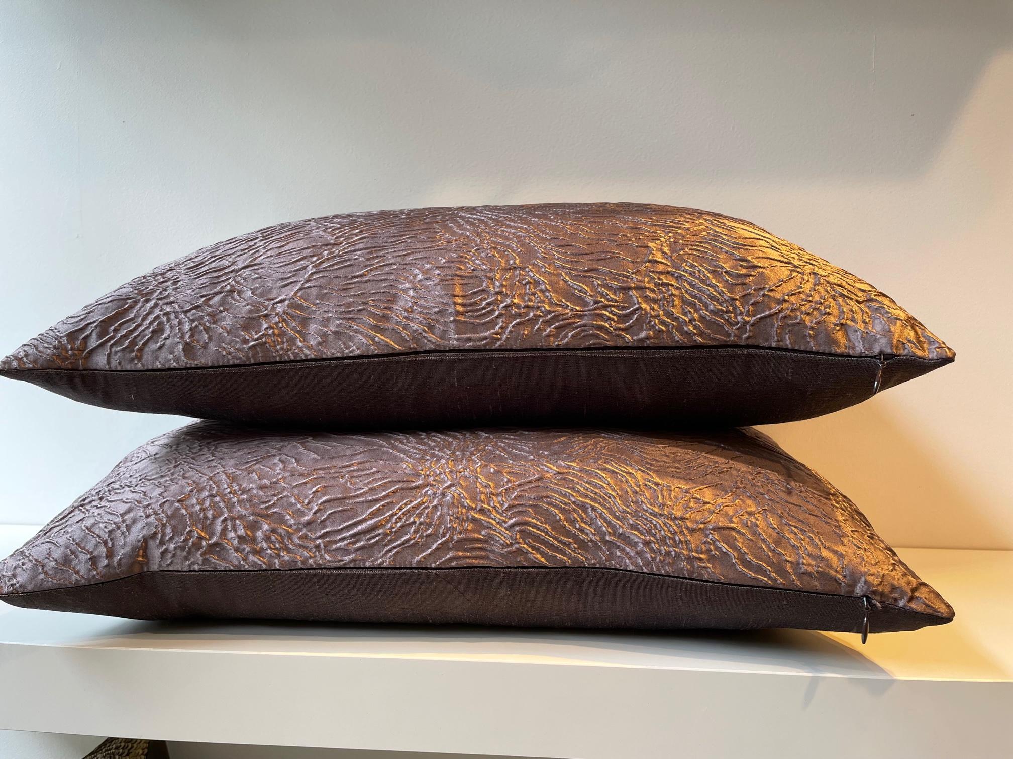 Pair of silk cushion covers Embossed floral design color heather at the front, plain hand woven silk color dark purple at the back, Concealed zip in the bottom seam,
Size 30 x 48cm.

As you can purchase for this cushion covers standard inner pads