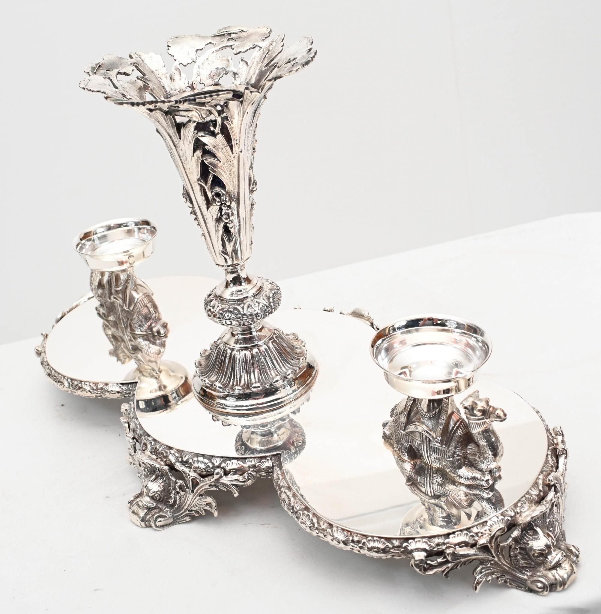 Stunning and unsual pair of Sheffield silver plate epergnes or centrepieces
Main centrepiece flanked by two smaller bowls to either side
Perhaps one of the main eye catching features are the camel supports, delightful
Patina to the silver plate is