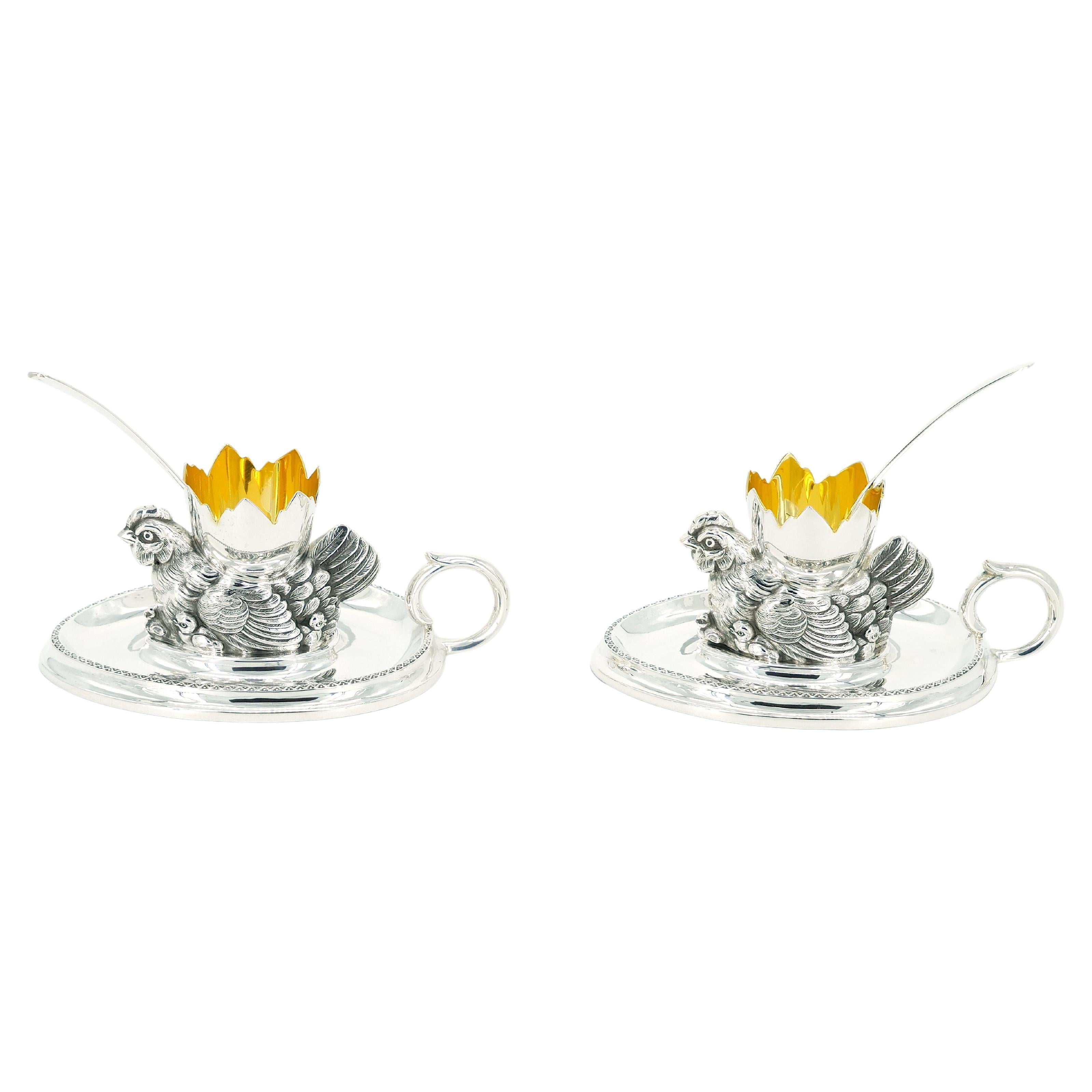 Indulge in the whimsical charm of our late 20th Century Italian Silver-Plated and Gold-Washed Interior Tableware – a delightful pair of serving soft boiled egg holder complete with a small spoon. These exquisite pieces showcase Italian craftsmanship