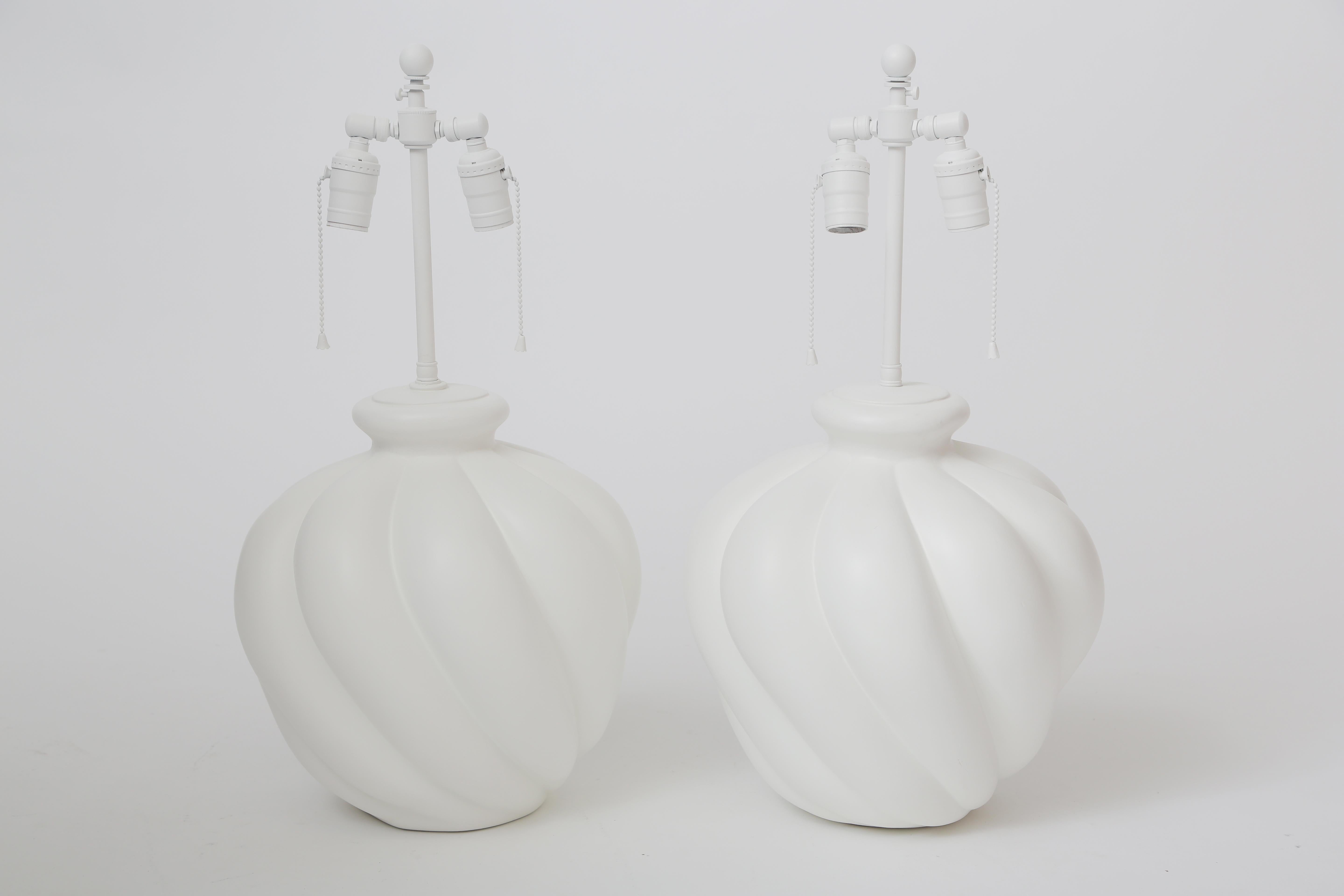 A pair of Sirmos gourd/melon lamps.
An organic form in white plaster.
