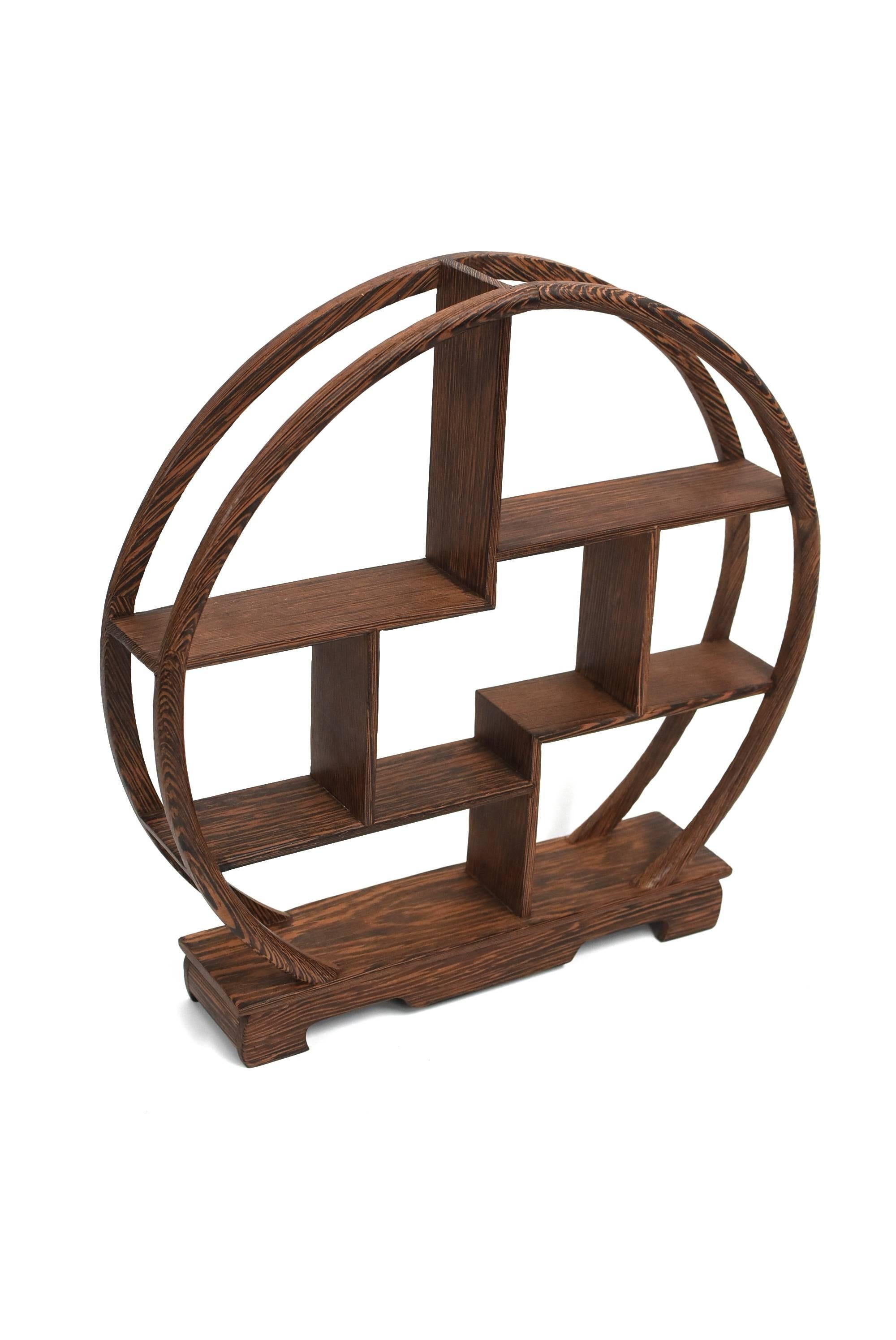 A pair of fine ji-chi-mu solid wood stands for display of your miniature collections. Perfect moon shape circle is dramatic and elegant. There are eight spaces of various heights and sizes to suit your little treasures. The wood is absolutely