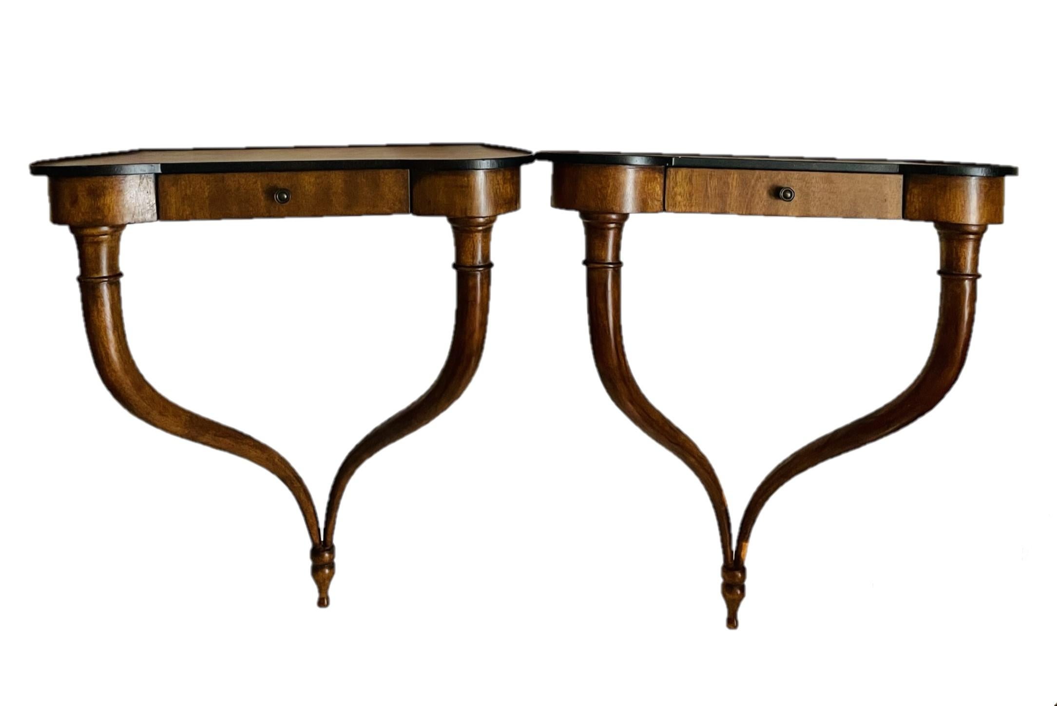 Pair Small Italian 1940s console tables in cherry wood, wall mounted shelves

Elegant vintage Italian serpentine carved cherry wood wall mounted console tables. Proportions are narrow and recall the classic Louis XV style as well as the work of