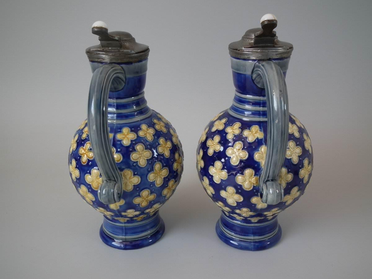 Pair Small Minton Majolica Pitchers With Mask Spouts 1