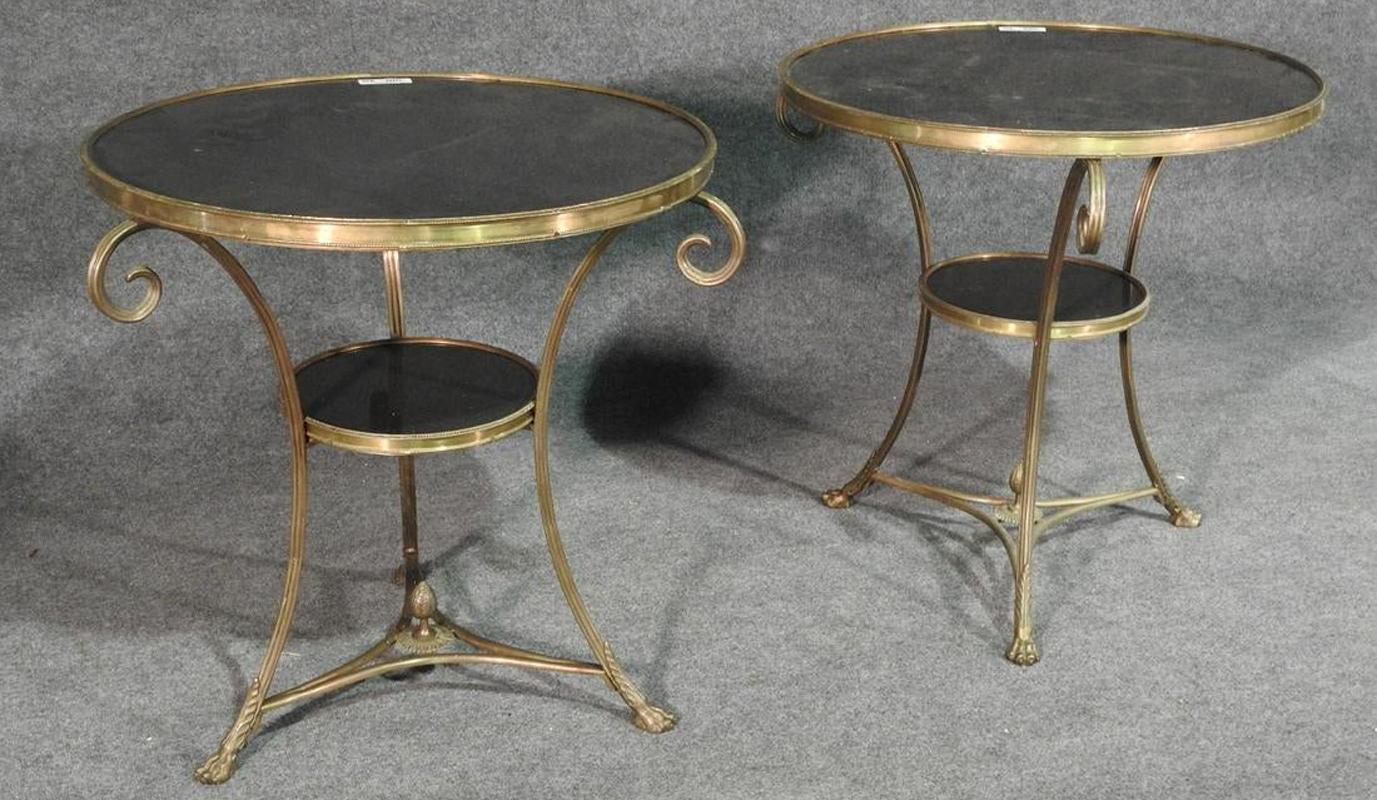 This is a great pair of Italian-made solid brass gueridons. The tables are the finest of their kind made in Italy and heavy and extremely sturdy. There are no damages to the tops or the frames. They each measure 27 1/2