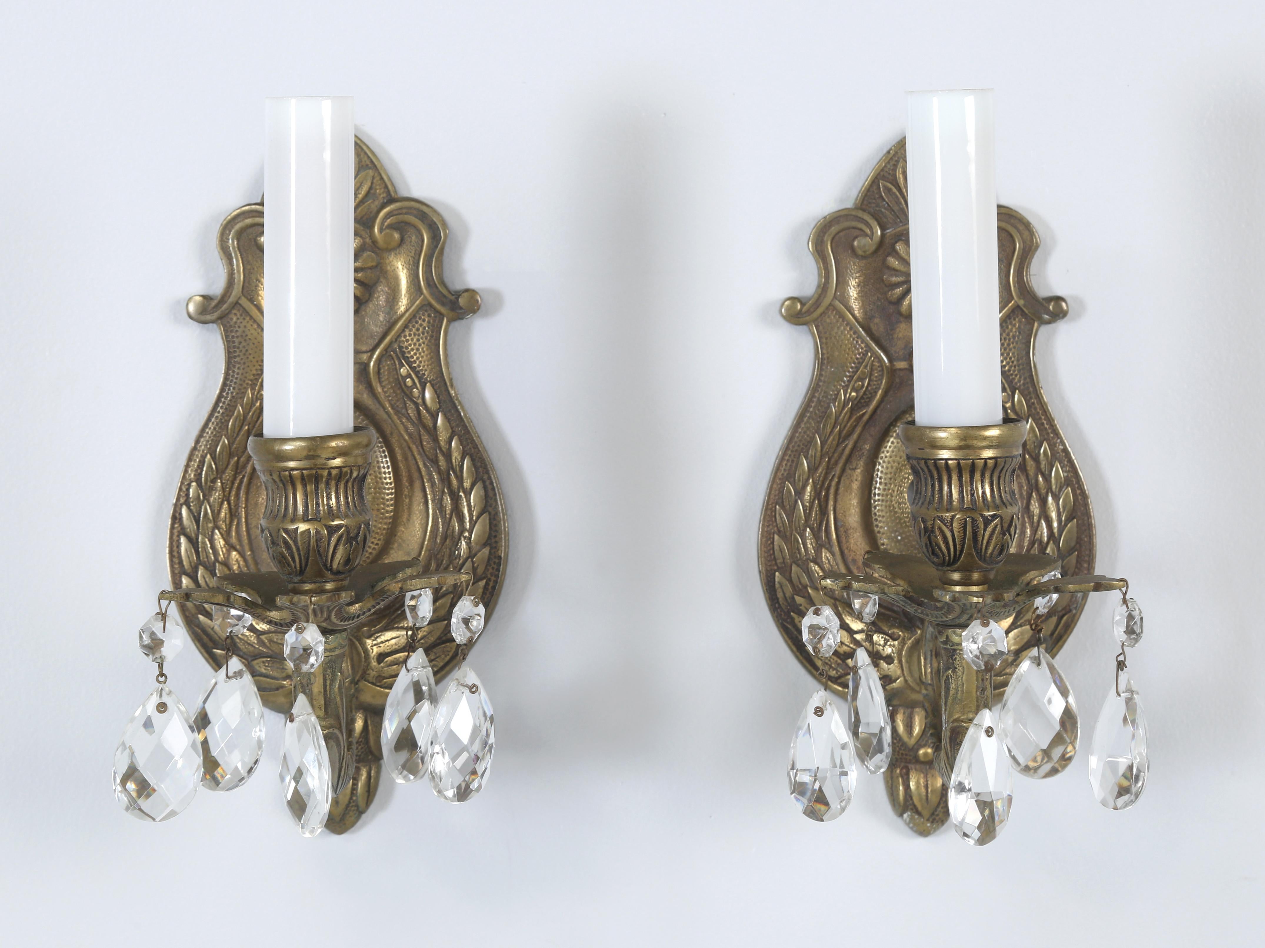 Pair of hand-made solid brass sconces removed from The John Rogerson Montgomery House, a residence designed by architect Howard Van Doren Shaw in Illinois. The home is a Georgian Revival architecture blended with Arts & Crafts details and was