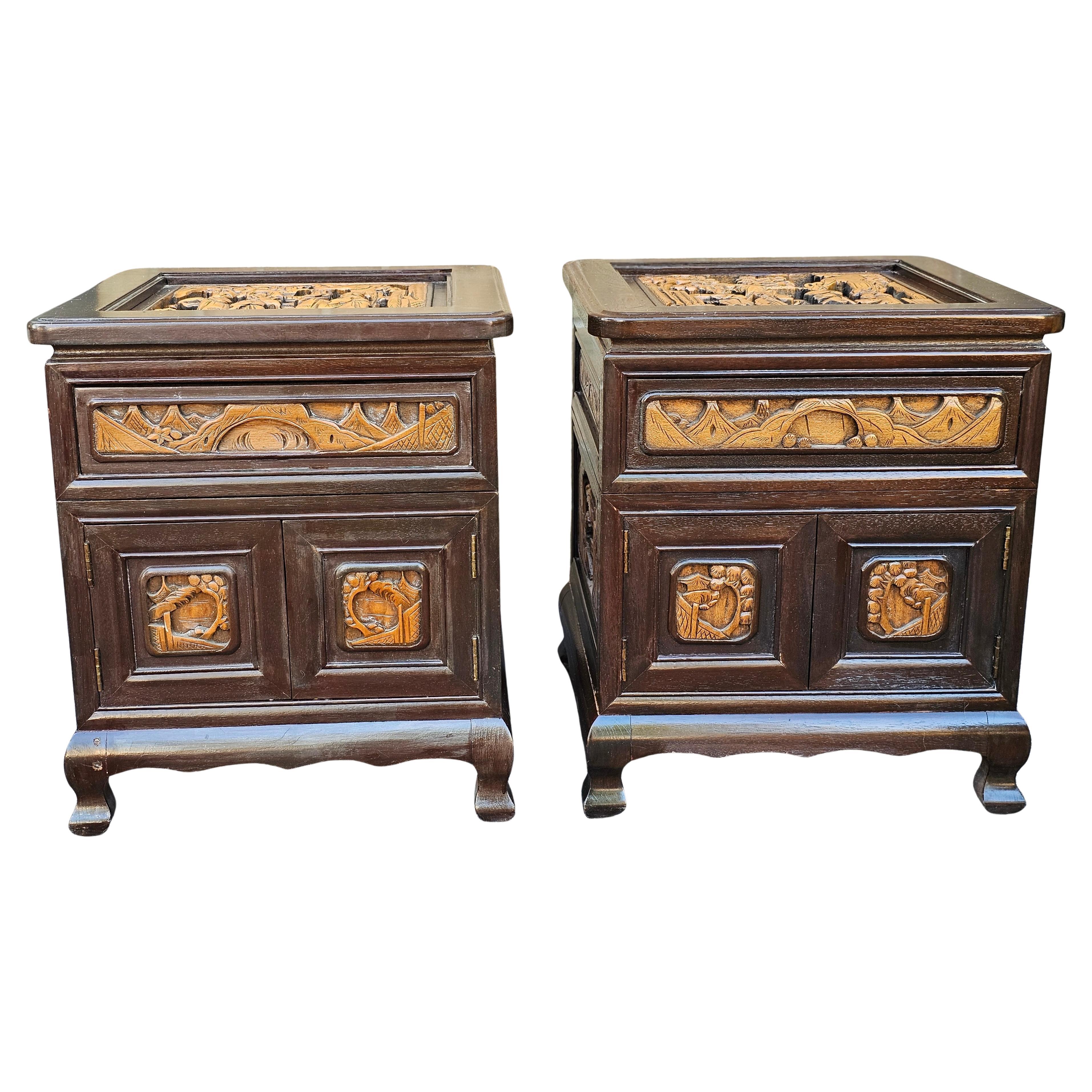 A Pair Southeast Asian all sides Carved Fruitwood Two-Part Side Table Cabinets with glass top.
Measures measure 20