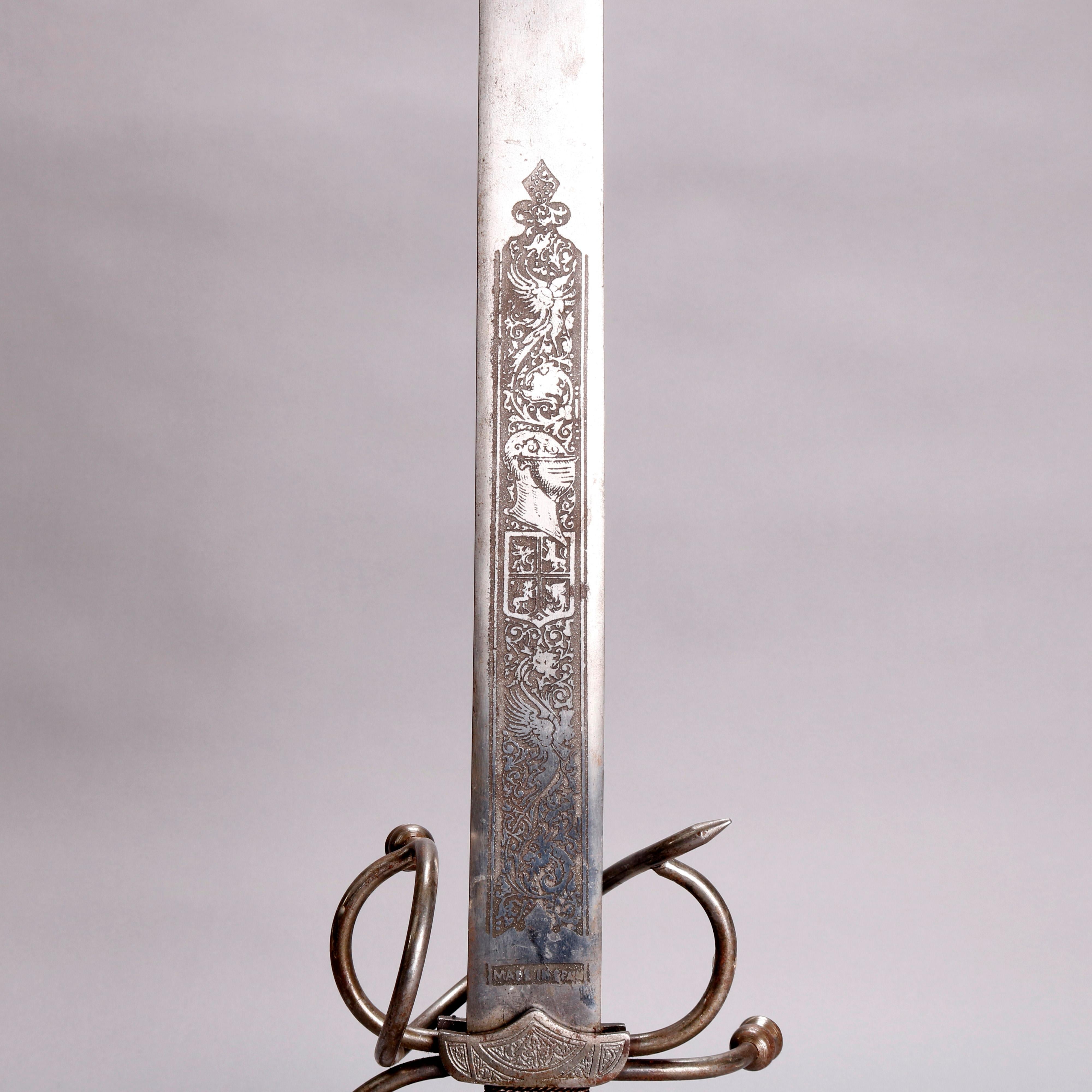 A pair of Spanish ceremonial dueling swords offer engraved blades foliate, knight profile and birds, scrolled guards, 19th century

***DELIVERY NOTICE – Due to COVID-19 we are employing NO-CONTACT PRACTICES in the transfer of purchased items. 