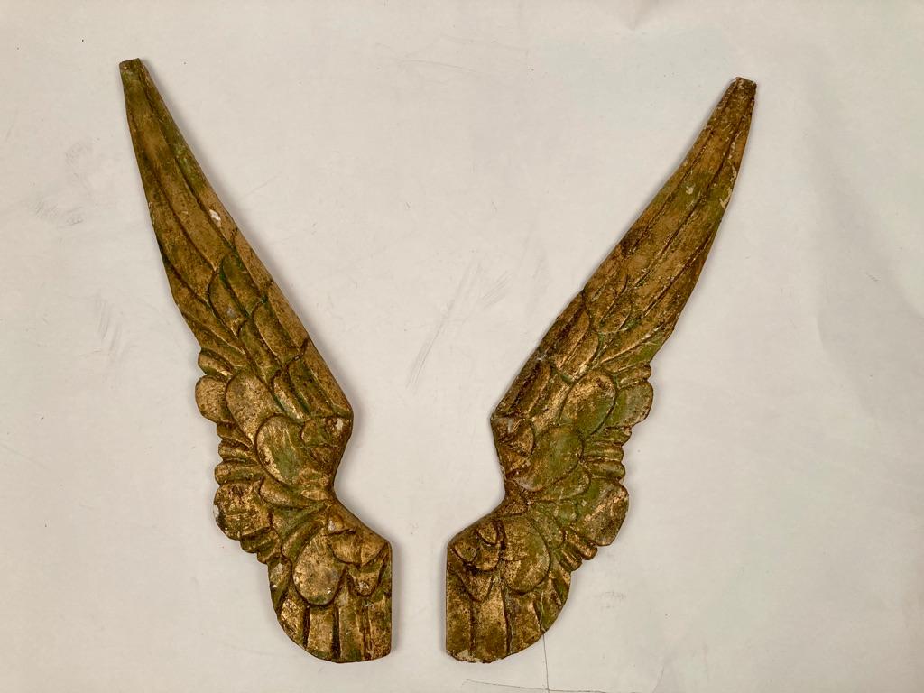 Pair of 19th century carved and gilt wood angels wings. These wings were used in religious festivals honoring various saints and holidays. They will make a great gift for the angelic one in your life. Or wonderful decoration imbued with the