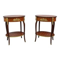 Paire de supports espagnols de style Louis XV en marqueterie de palissandre et en bronze doré figuratif