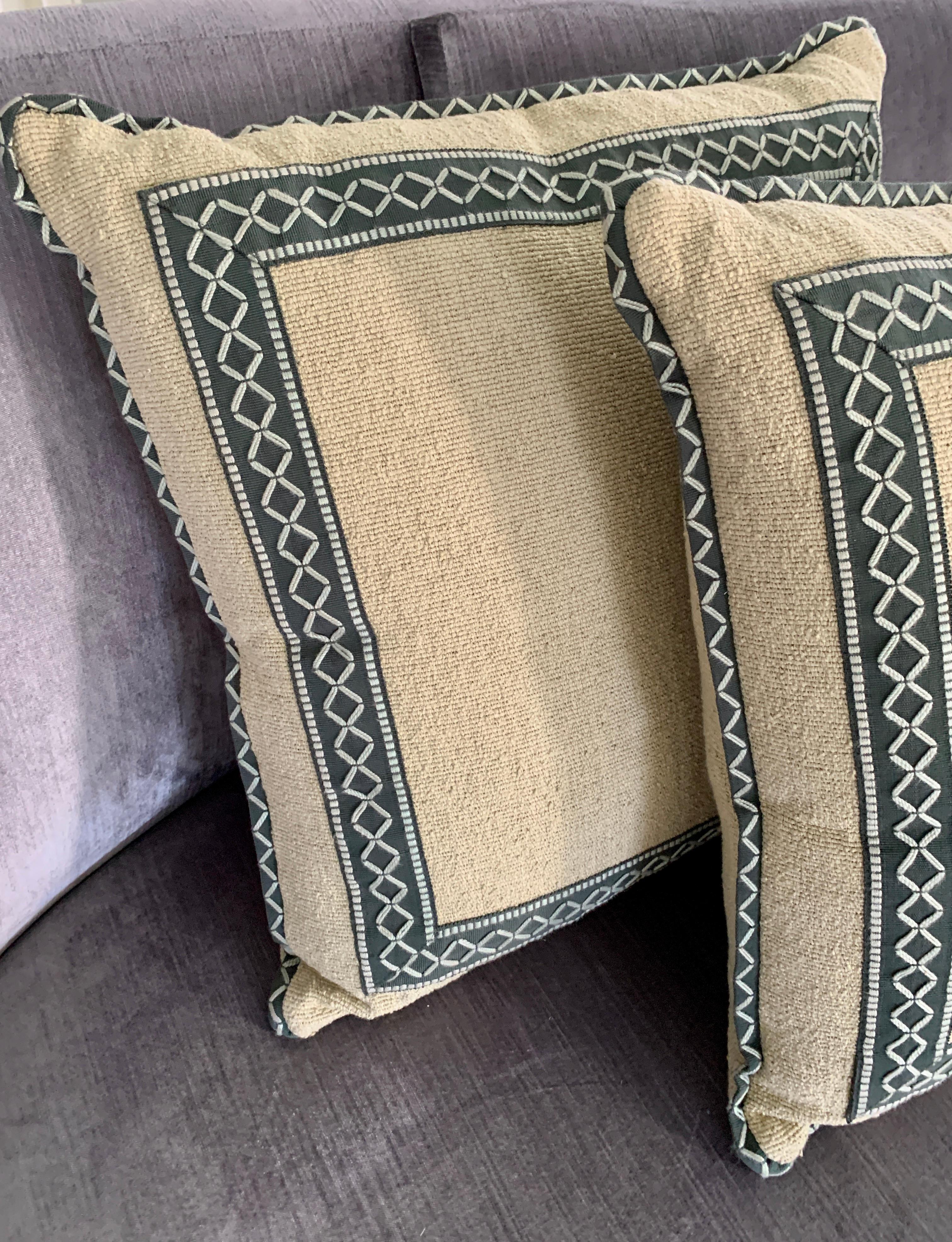 Pair of beige field pillows with dark grey-green diamond embroidered custom trim - the pair are wonderfully made with zipper and insert. Perfect compliment for many sofa's or chairs - very decorative and handmade look.