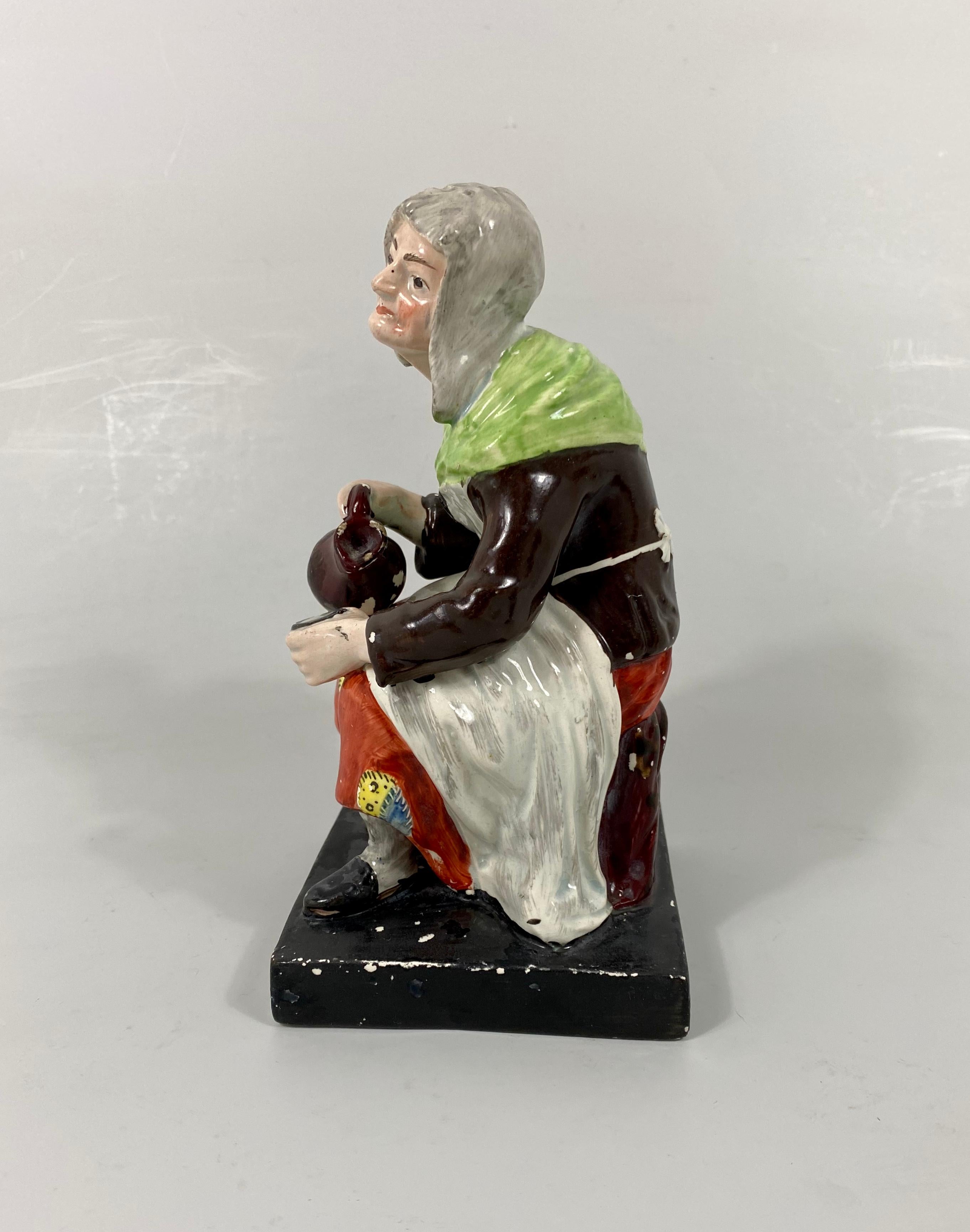 Cuit Paire de figurines de Staffirdshire 'Jobson & Nell', Enoch Wood, vers 1820 en vente