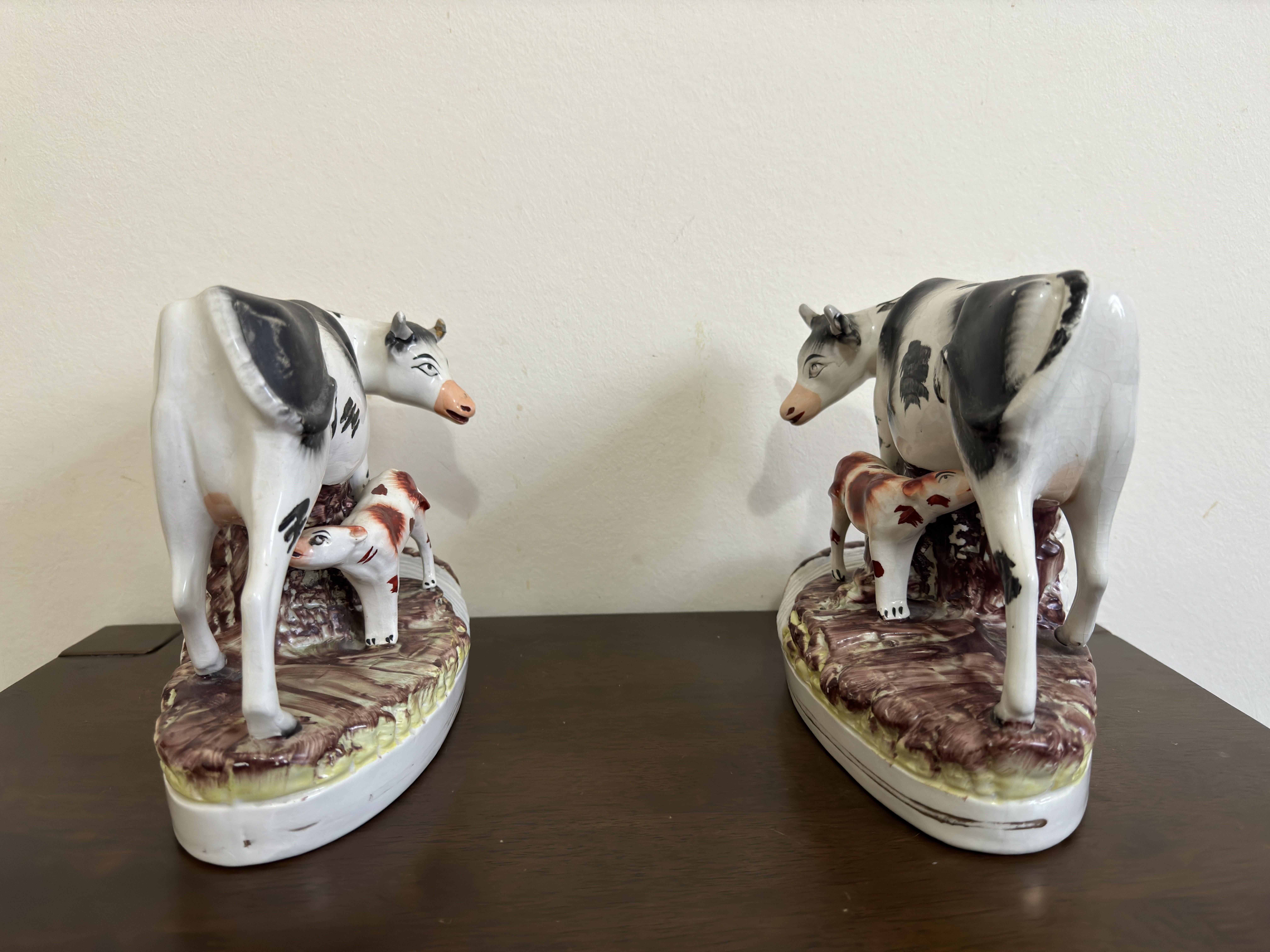 Late 19th Century Pair Staffordshire Cows and Calves For Sale
