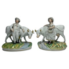 Antique Pair Staffordshire pottery cow groups, Thomas Parr, c. 1860.