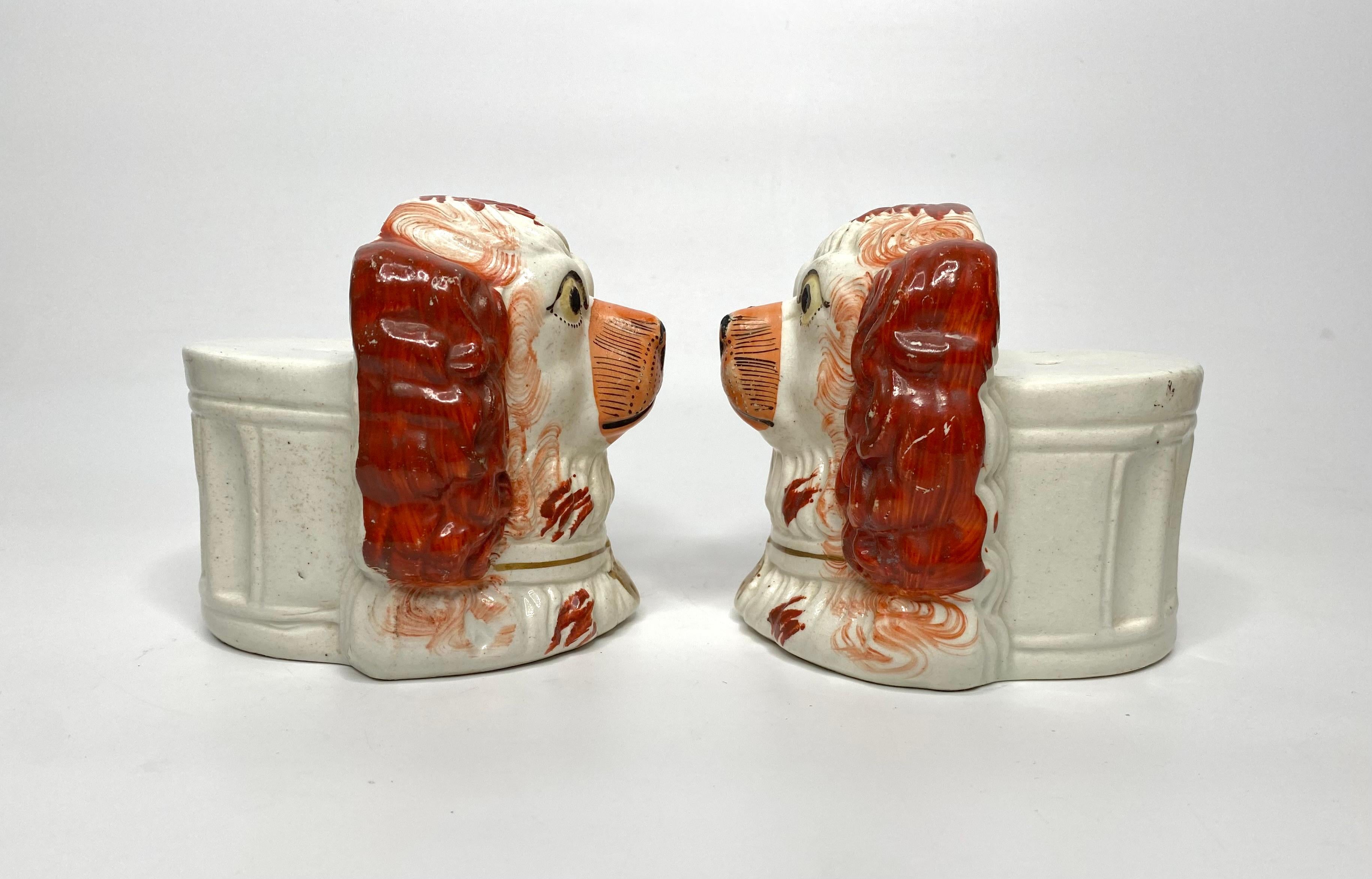 English Pair Staffordshire pottery Spaniel window rests, c. 1850. For Sale