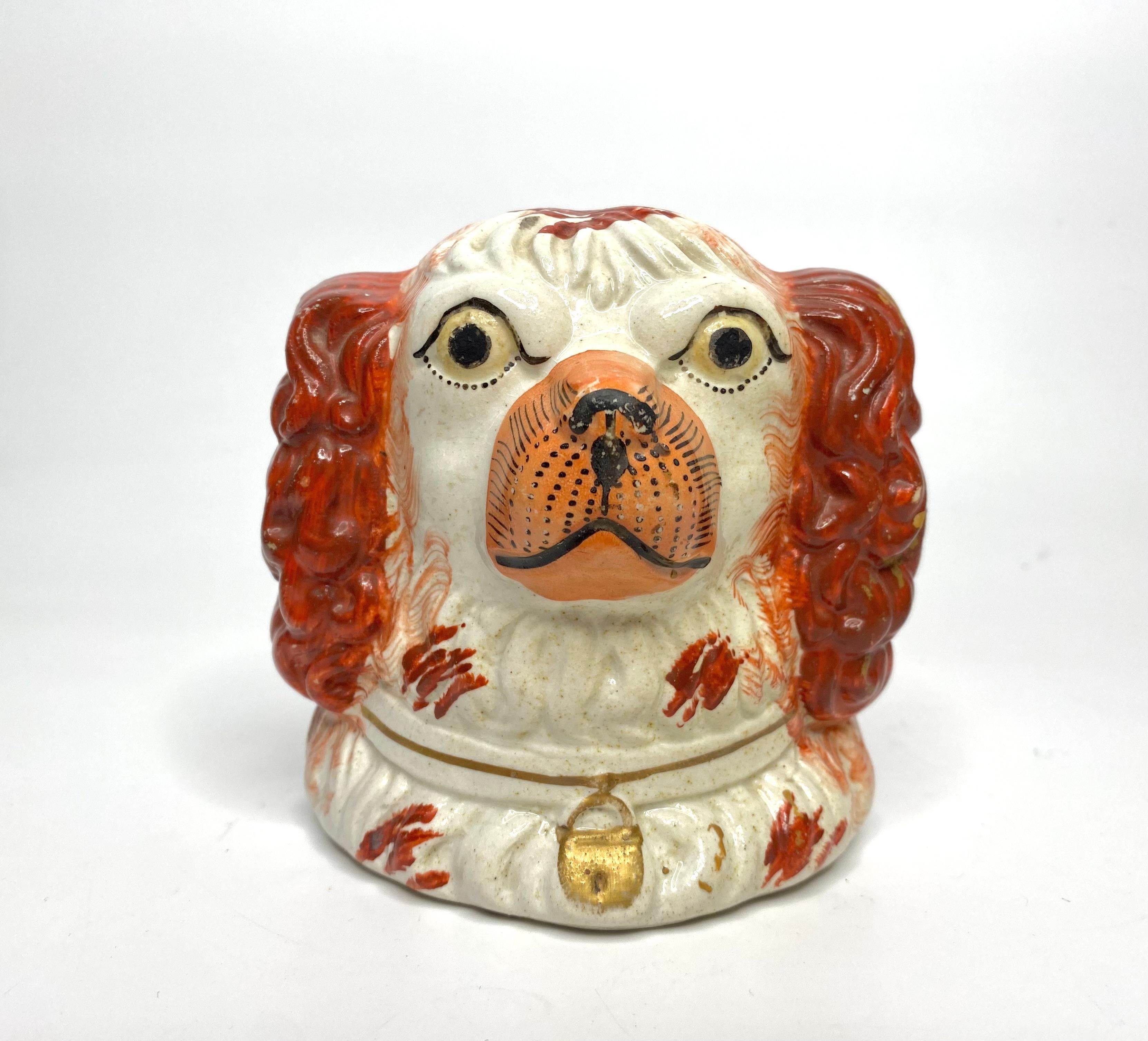 Fired Pair Staffordshire pottery Spaniel window rests, c. 1850. For Sale