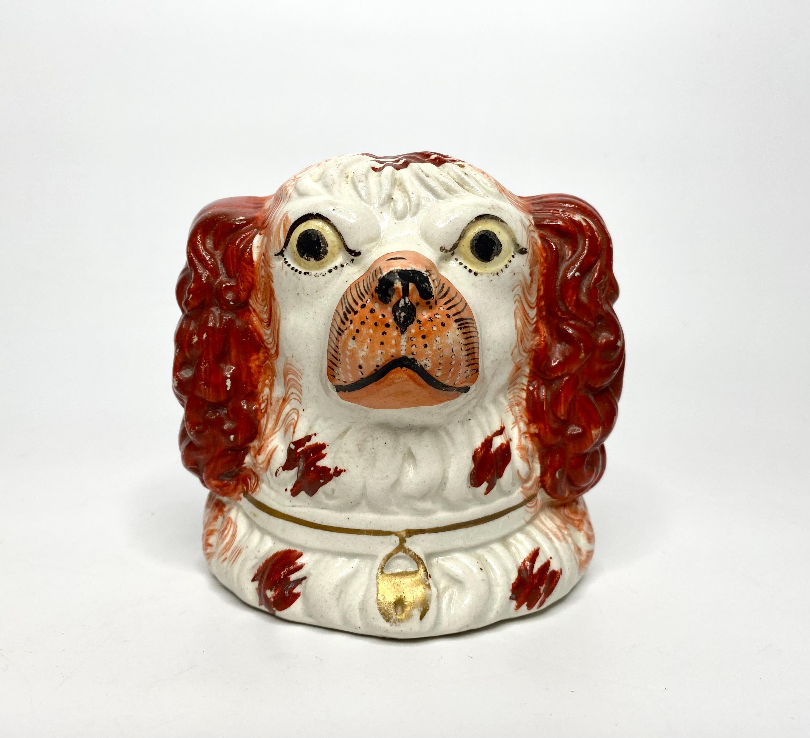 Mid-19th Century Pair Staffordshire pottery Spaniel window rests, c. 1850. For Sale