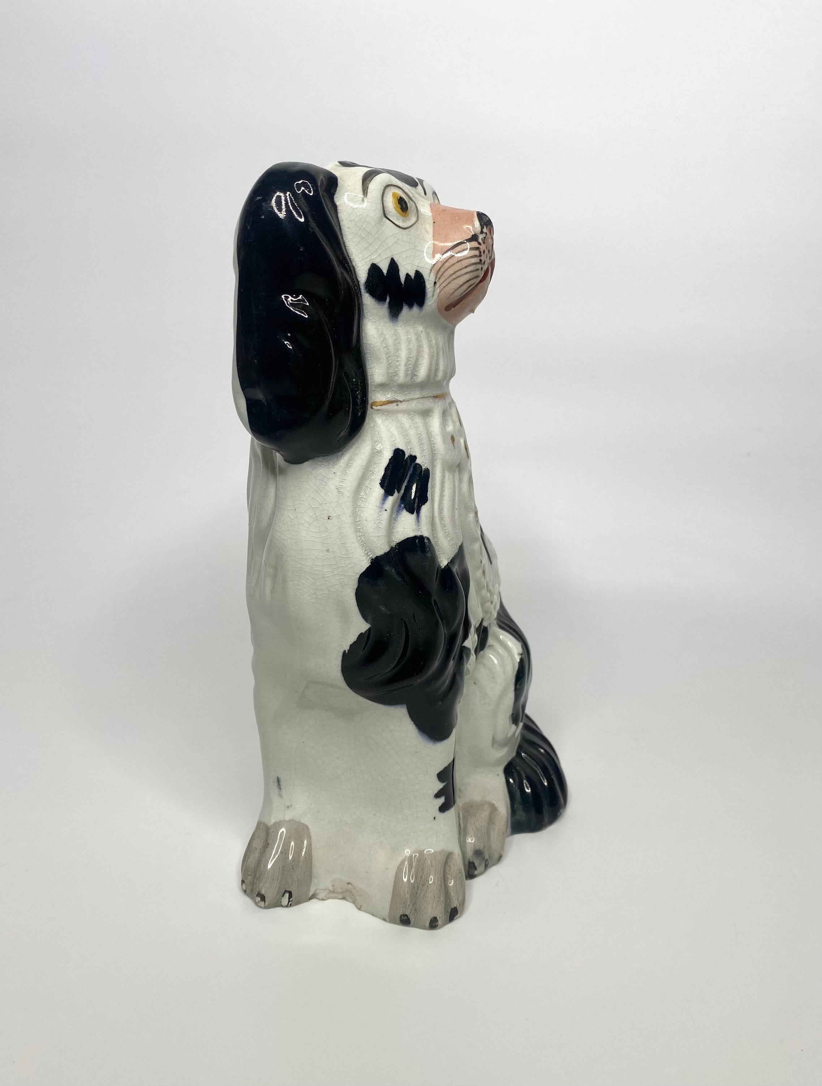 Pair Staffordshire pottery Spaniels, c. 1850. 1