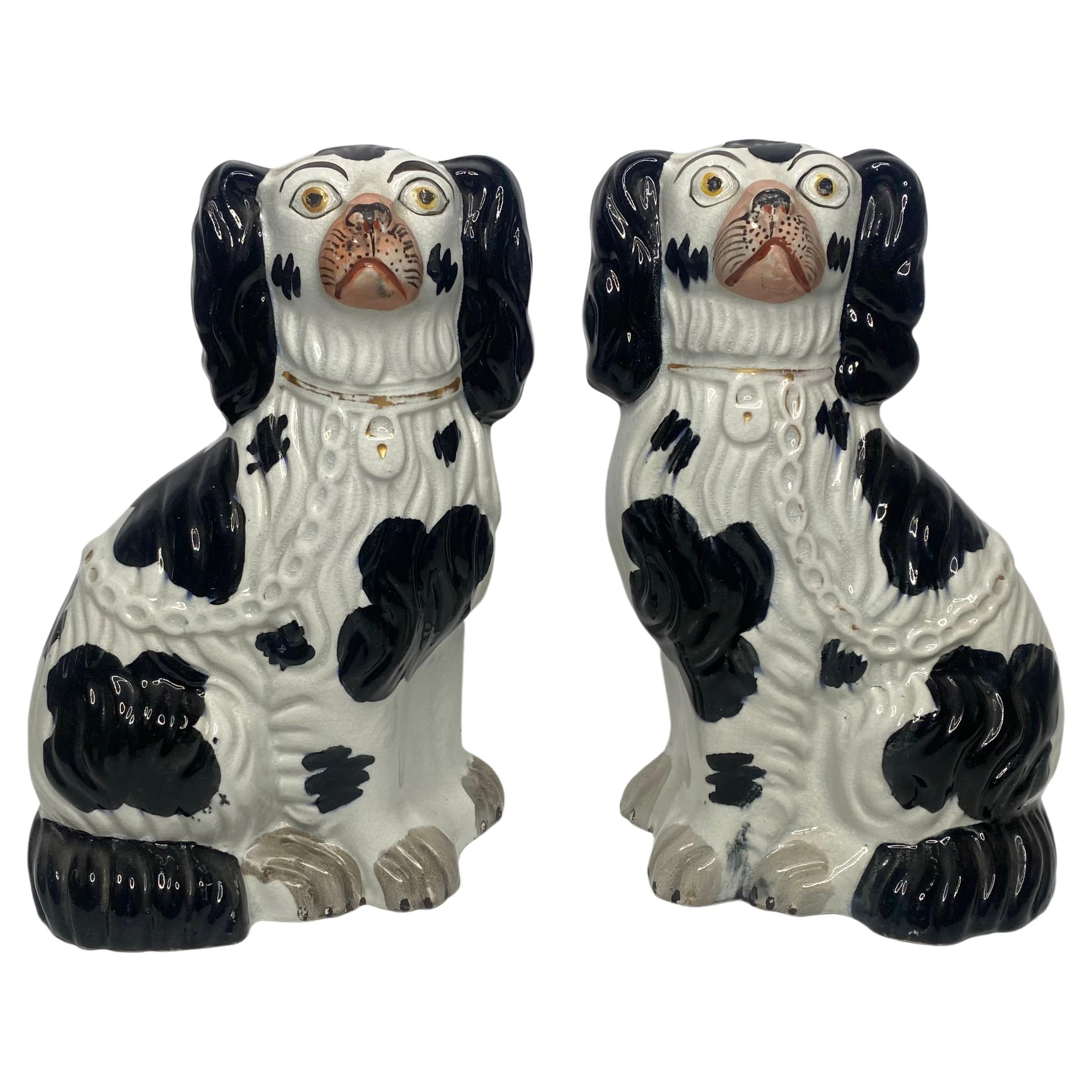 Pair Staffordshire pottery Spaniels, c. 1850.