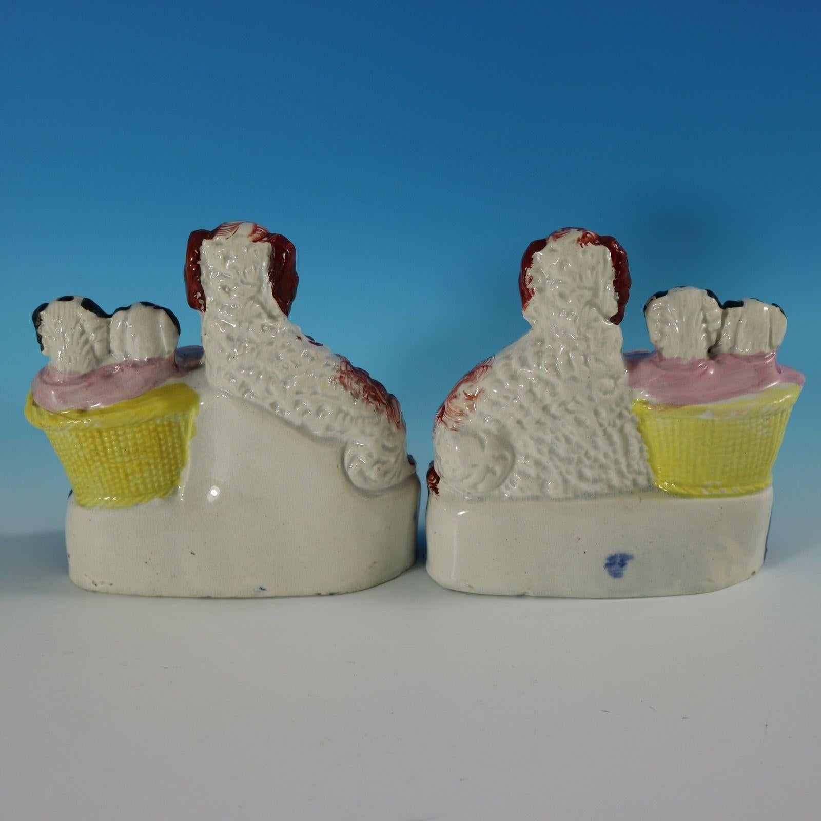 Earthenware Pair Staffordshire Spaniel and Pups in Wash Baskets For Sale