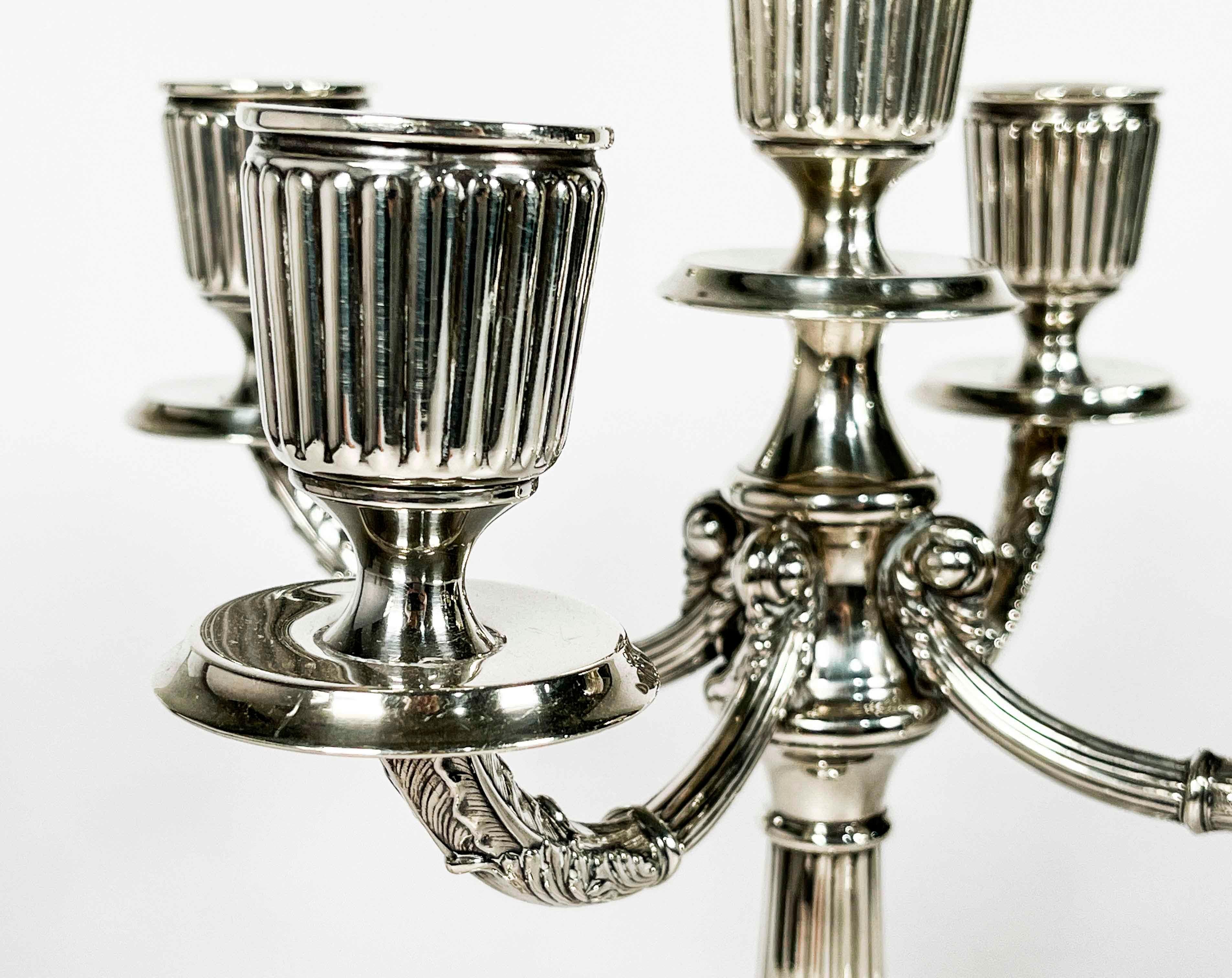 Beautiful five lights pair candelabras in silver, you can see marks on the bottom.
