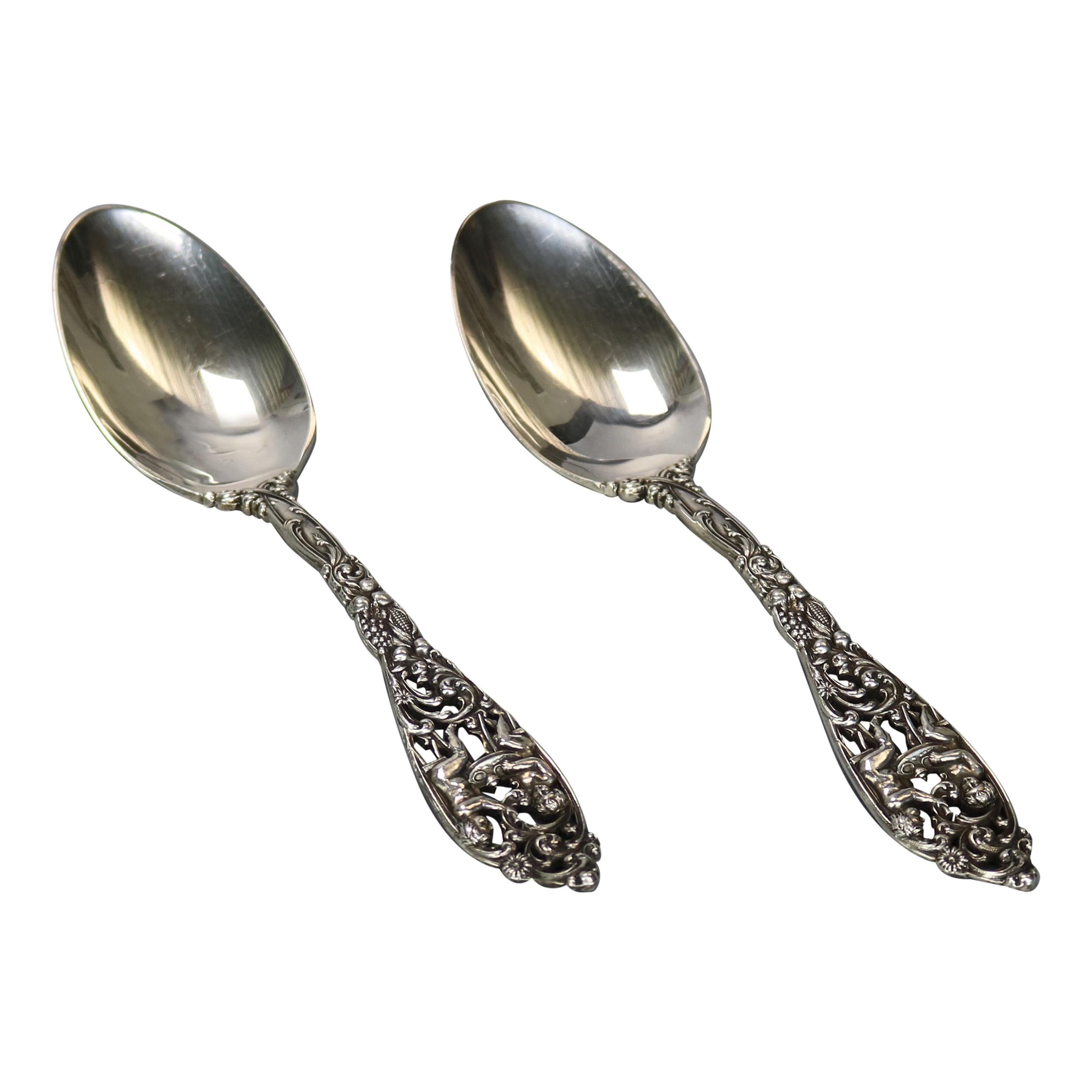 Pair Sterling Silver "Labors of Cupid" Serving Spoons by Dominick & Haff, c1890