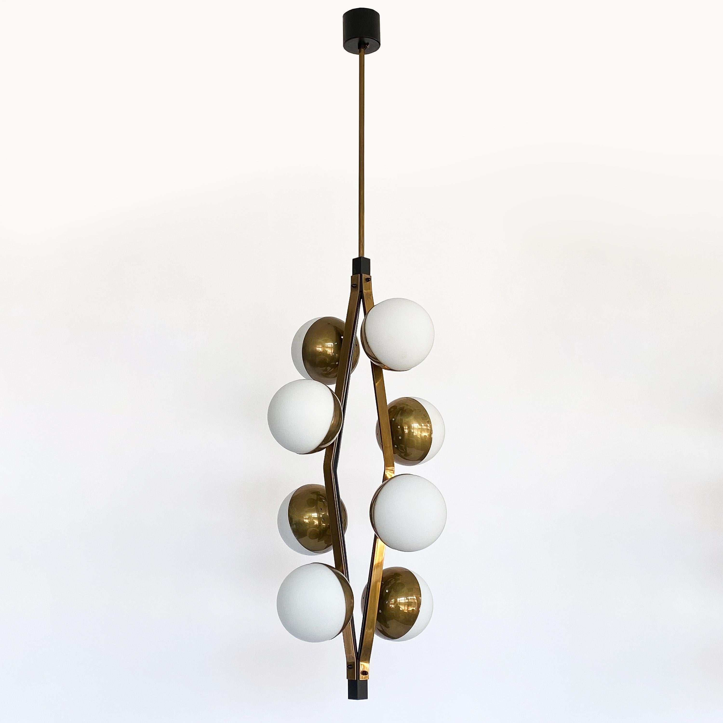 Pair of Stilnovo Brass Eight Globe Pendant Chandeliers In Good Condition In Chicago, IL
