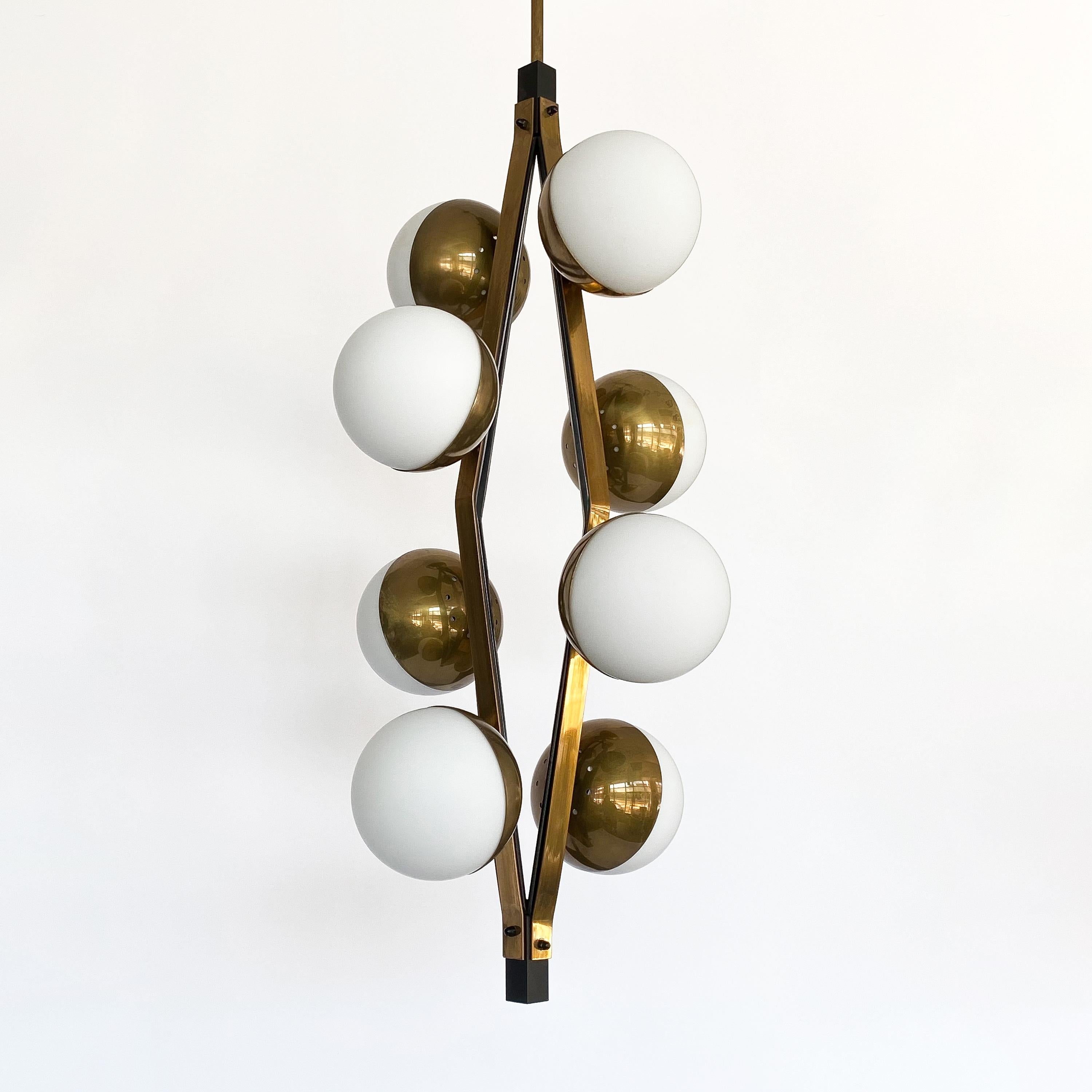 Mid-20th Century Pair of Stilnovo Brass Eight Globe Pendant Chandeliers