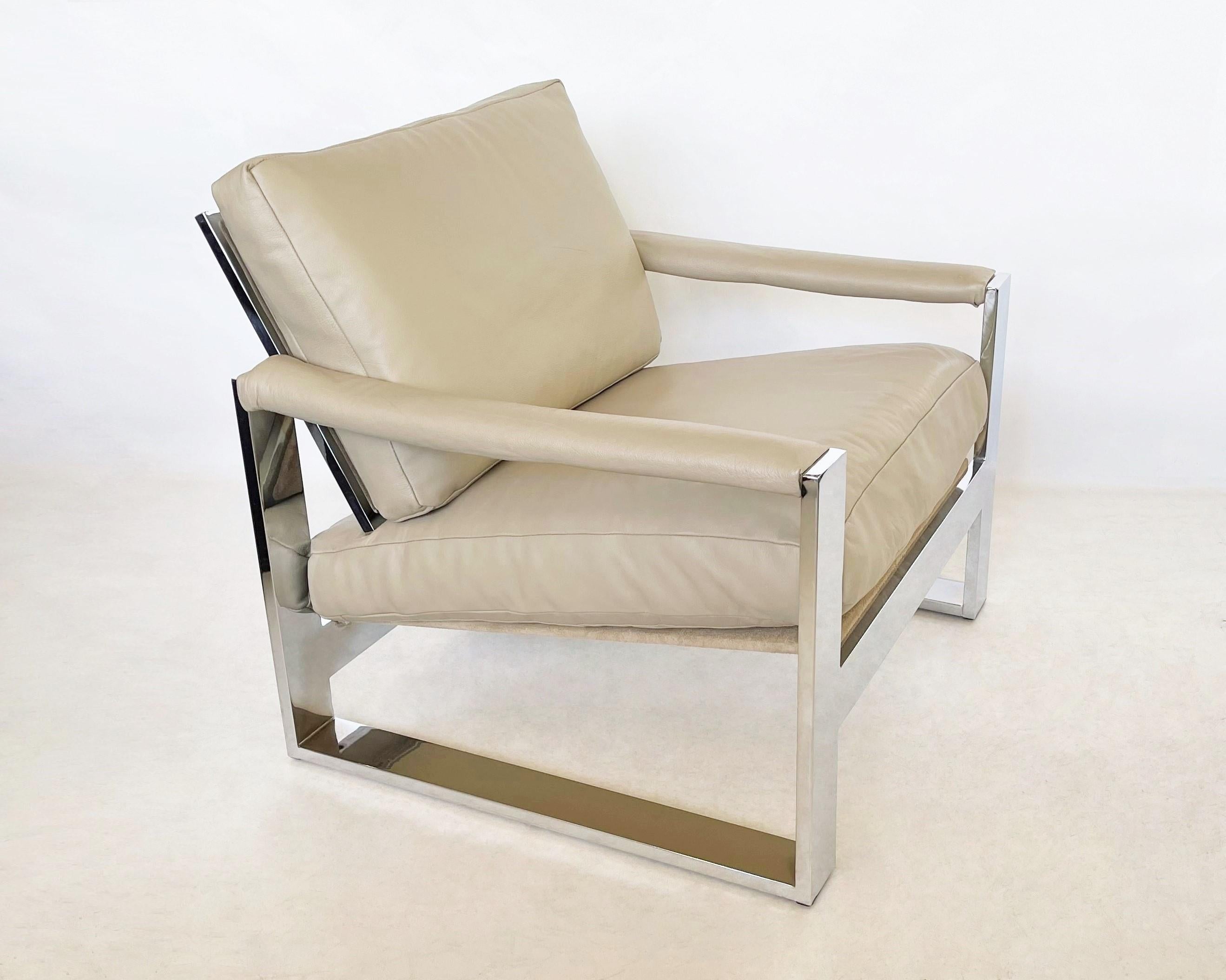 Glamorous, over-scaled, streamlined pair of chairs from a limited production collection designed Milo Baughman Classic for Thayer Coggin. Originally designed in 1972, these chairs are uniquely designed with padded arms and luxurious seating and back