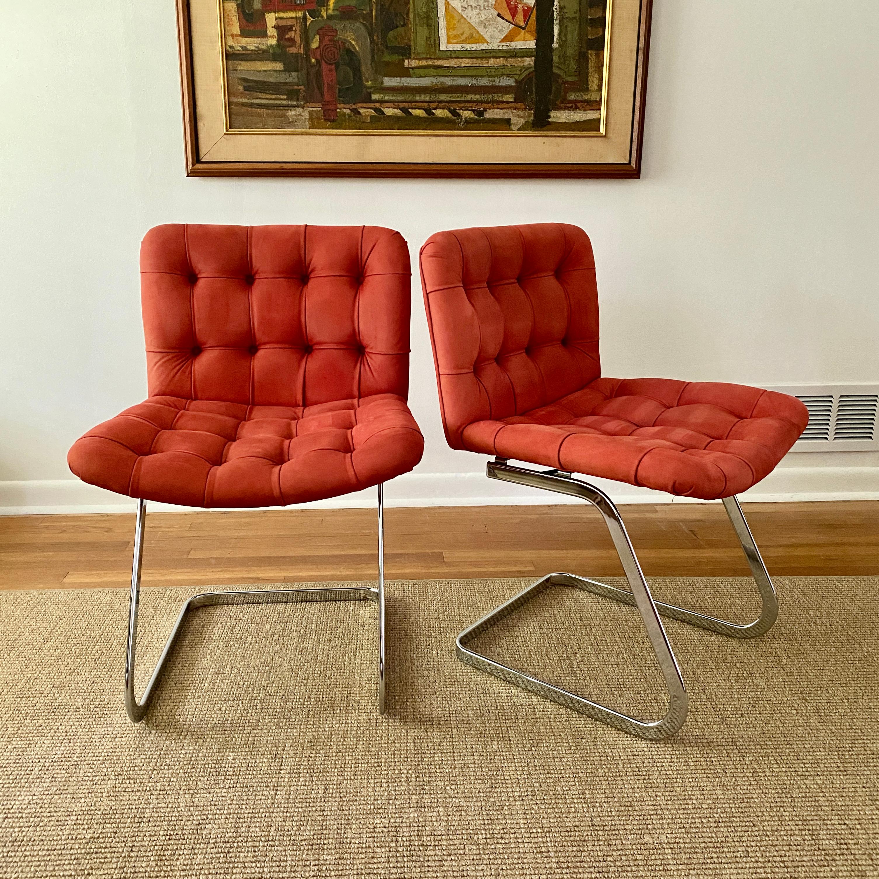 A beautiful pair of vintage cantilevered chairs designed by Robert Haussmann for de Sede, the chairs were distributed by Stendig.  The model number for the chairs is RH - 304 and they were produced between 1955 - 1960.  The legs of the chairs are