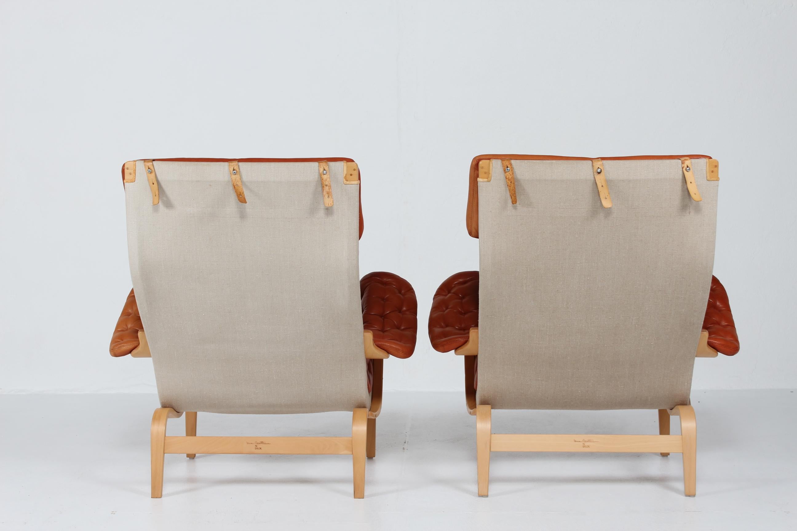 Pareja de butacas suecas Bruno Mathsson Pernilla, cuero color coñac Años 70 en venta 2