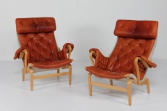 Paire de fauteuils suédois Bruno Mathsson Pernilla, cuir couleur cognac 1970