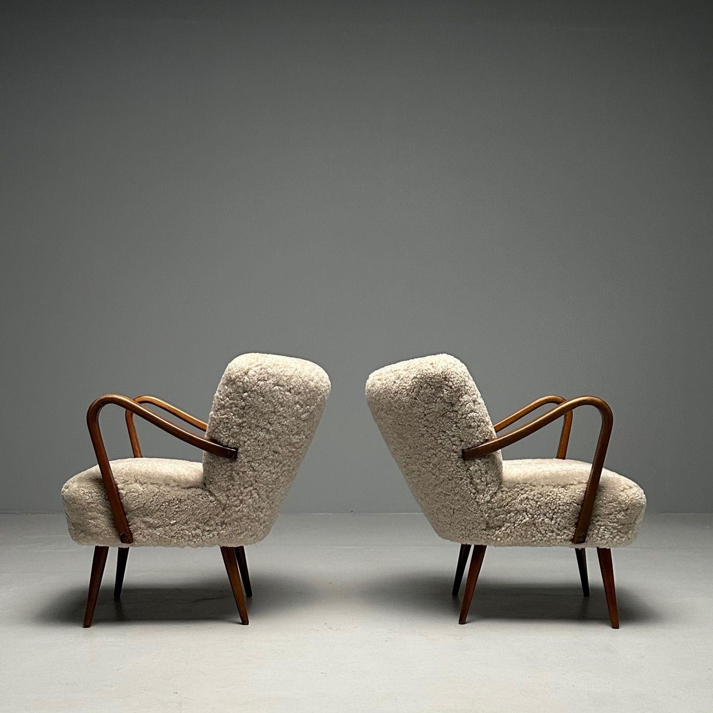 Mid-20th Century Swedish Designer, Mid-Century Modern, Beige Sheepskin Lounge Chairs, Beech, 1950